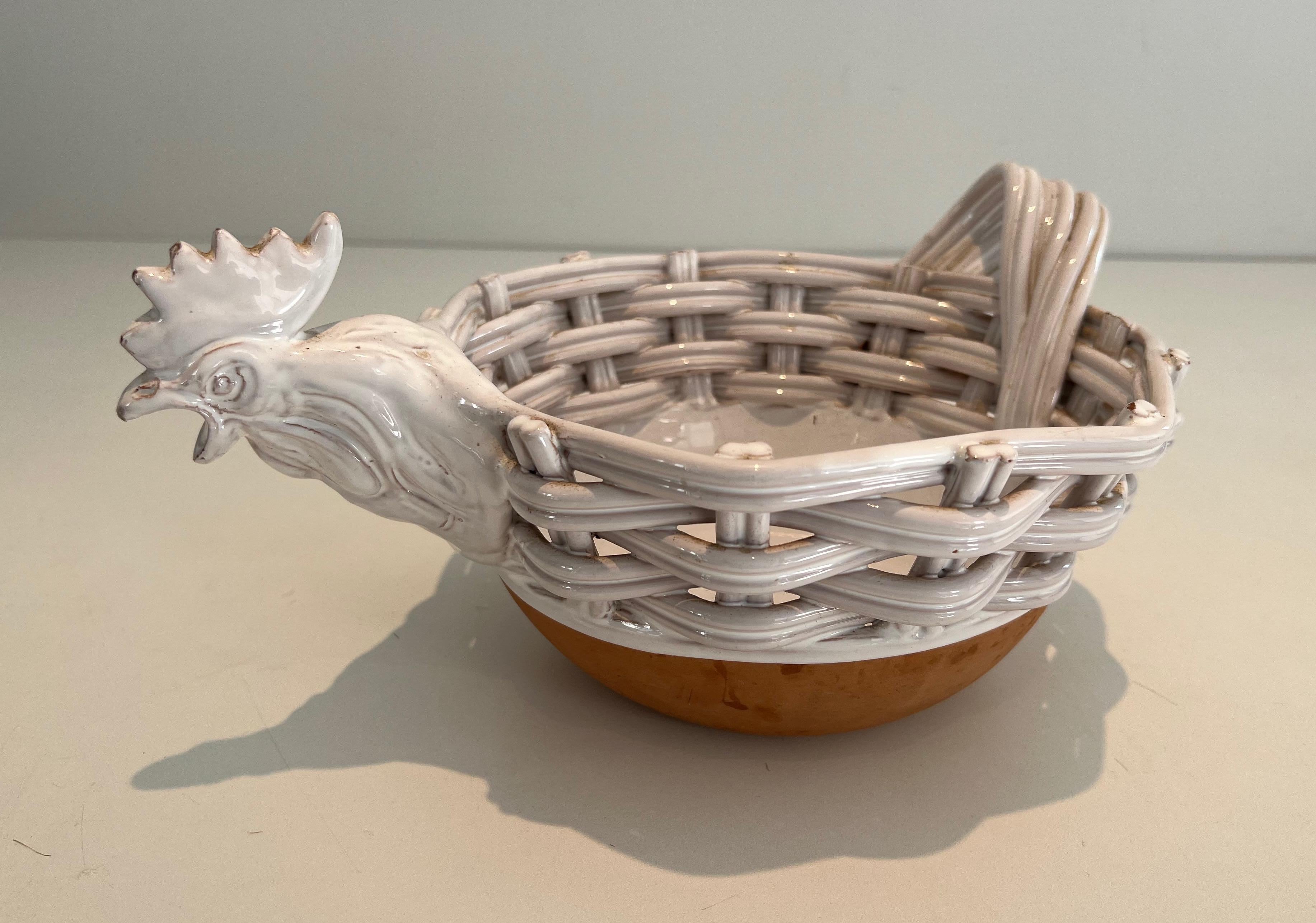 This rare and unusual fruit bowl representing a chicken is made of glazed ceramic. This is a  French work. Circa 1970