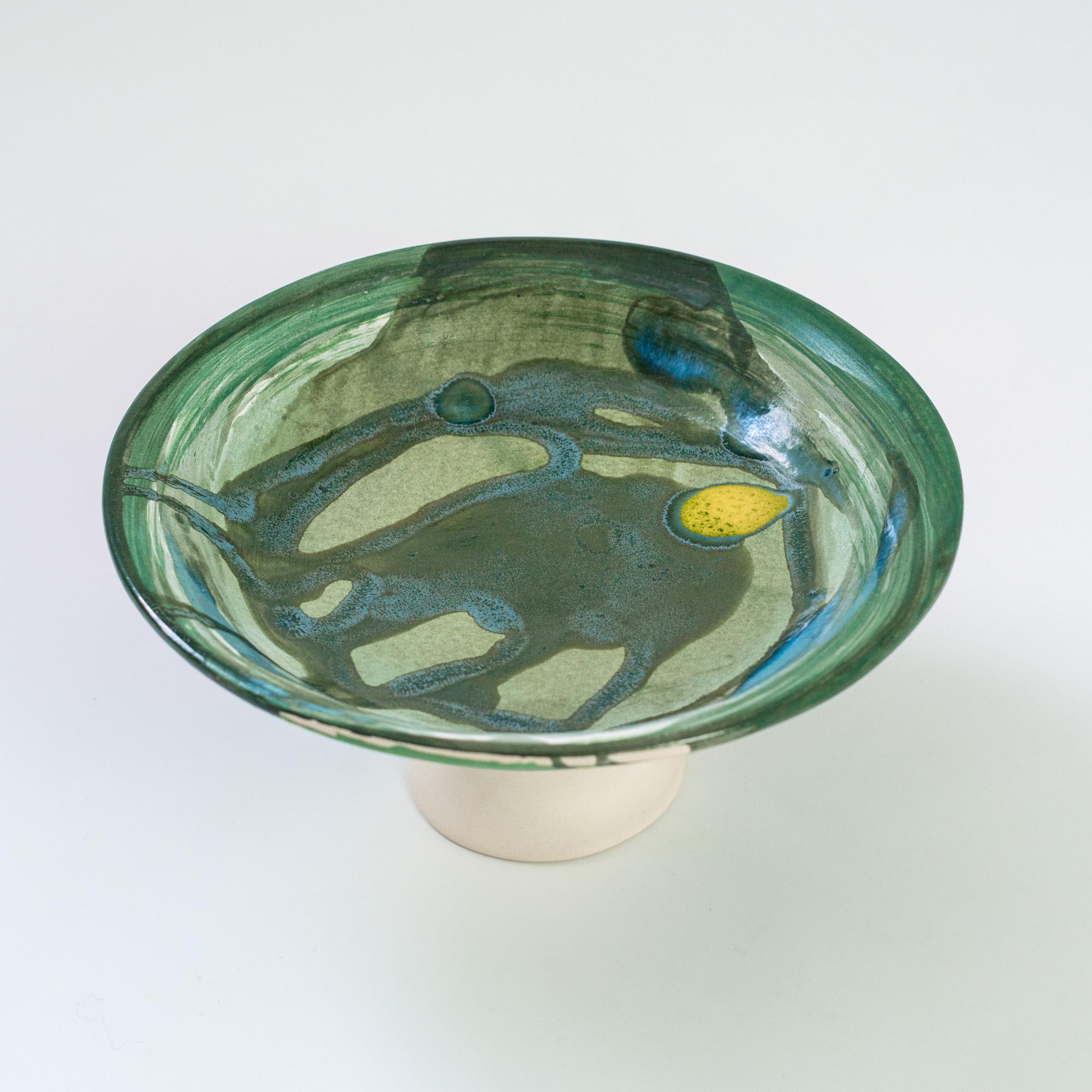 Traditionally shaped fruit dish by contemporary French ceramist and colorist Claire de Lavallée.
  