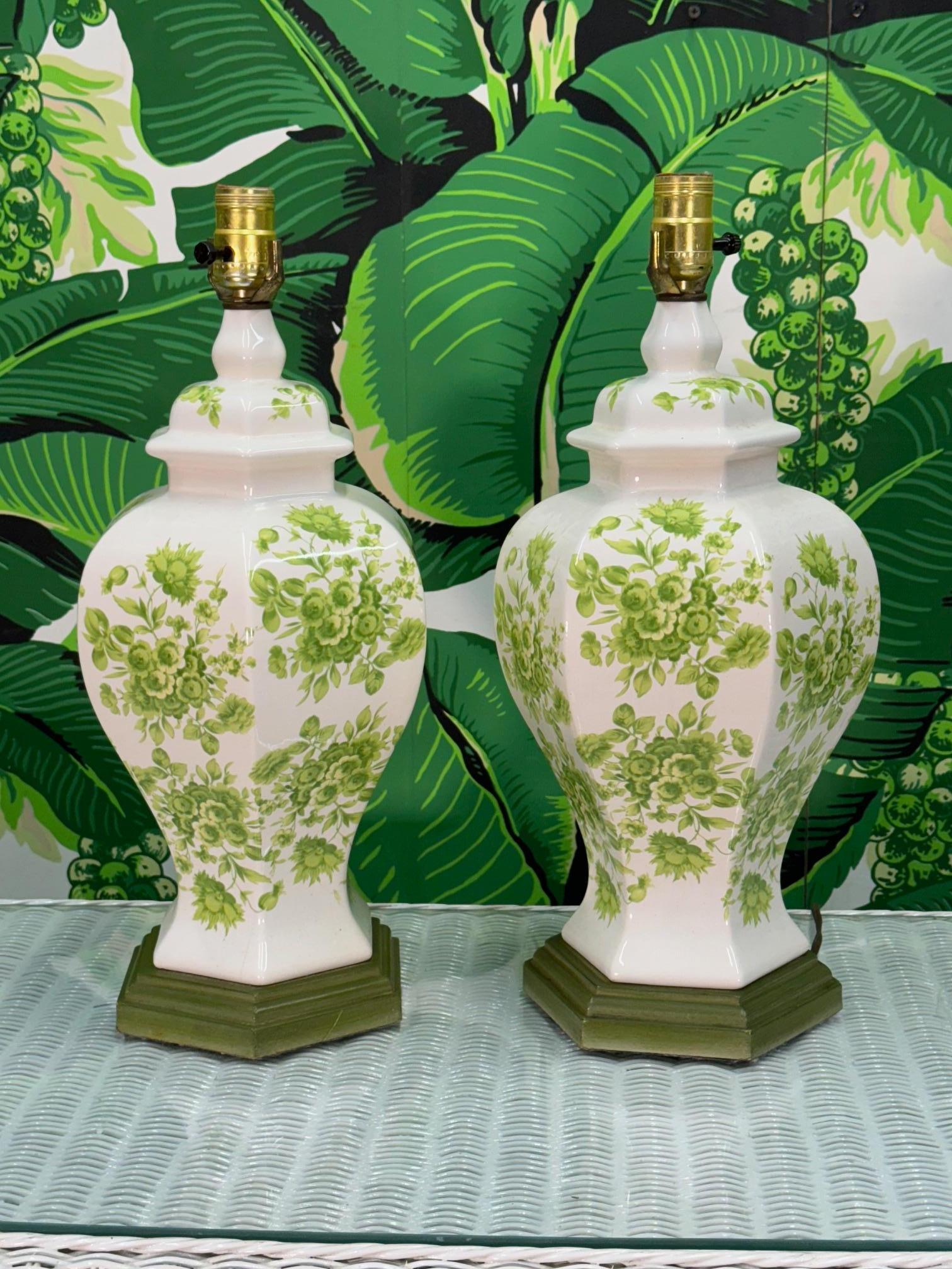 Pair of vintage ceramic table lamps feature hand painted vines and leaves and a bright glossy finish. Good condition with minor imperfections consistent with age, see photos for condition details.
For a shipping quote to your exact zip code, please