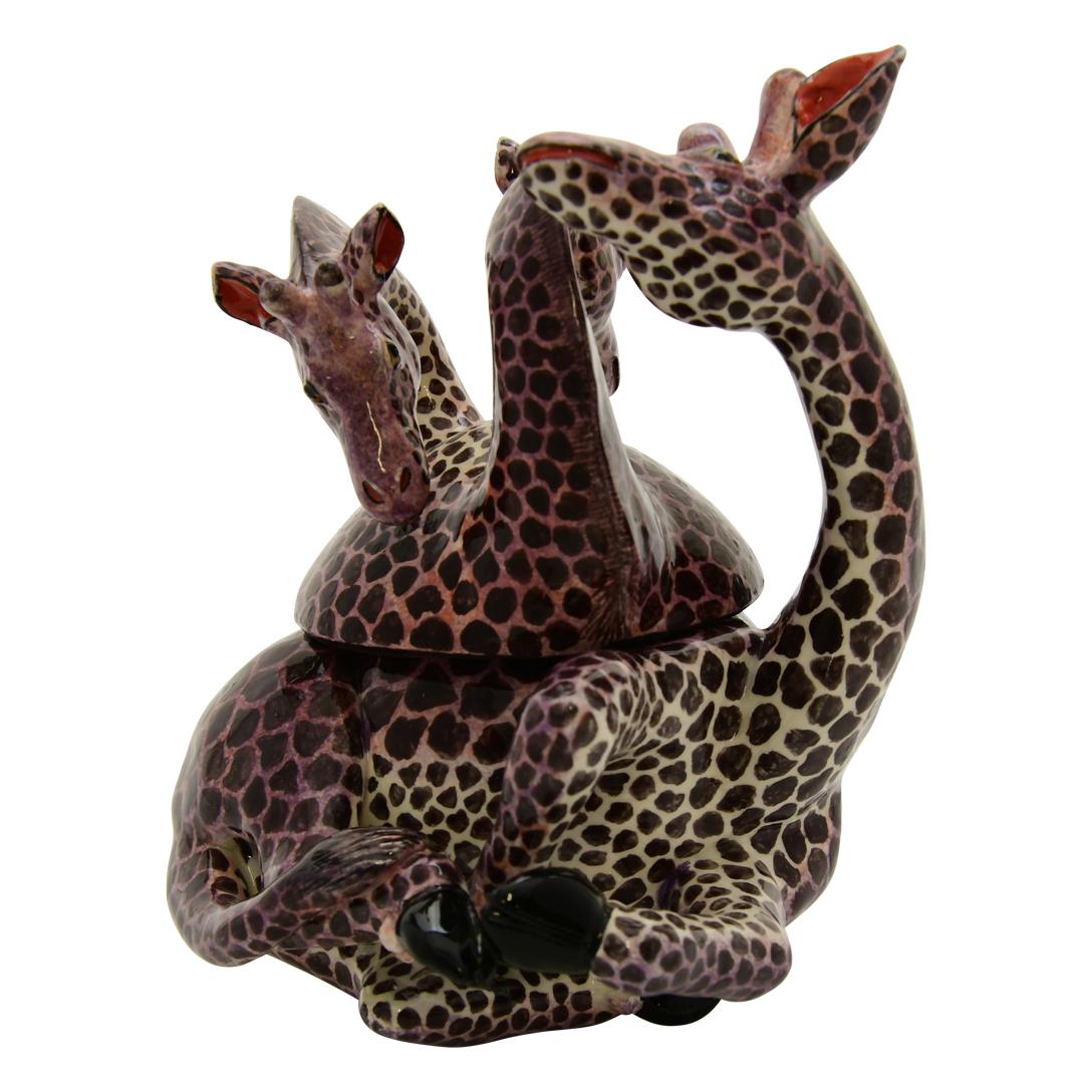 captivating piece Giraffe Jewelry box. Handmade ceramics often bear the mark of the artisan's skill and creativity, and being made in South Africa likely adds an extra layer of cultural richness to its design. The uniqueness in both the crafting