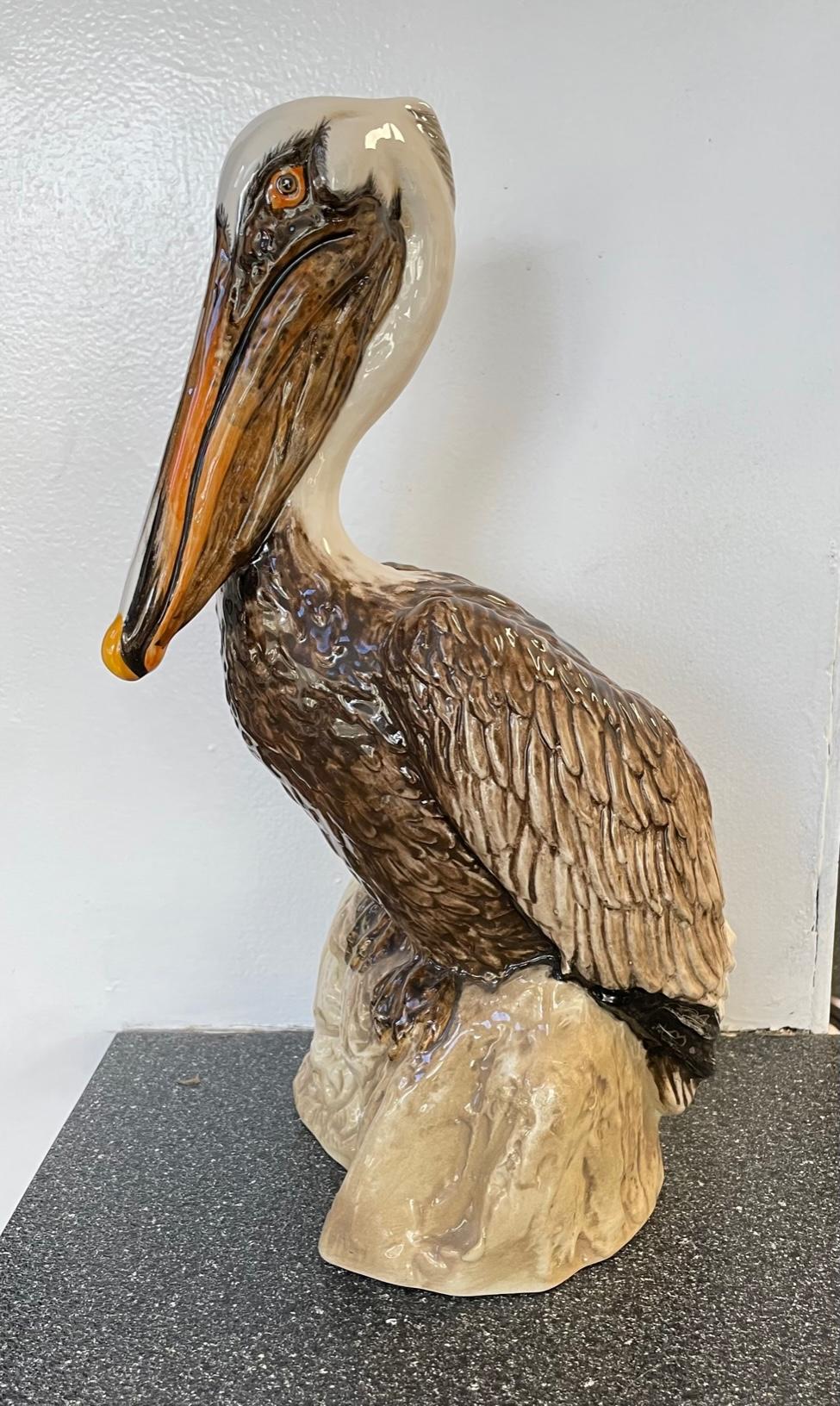 Ceramic pelican figurine stands 15