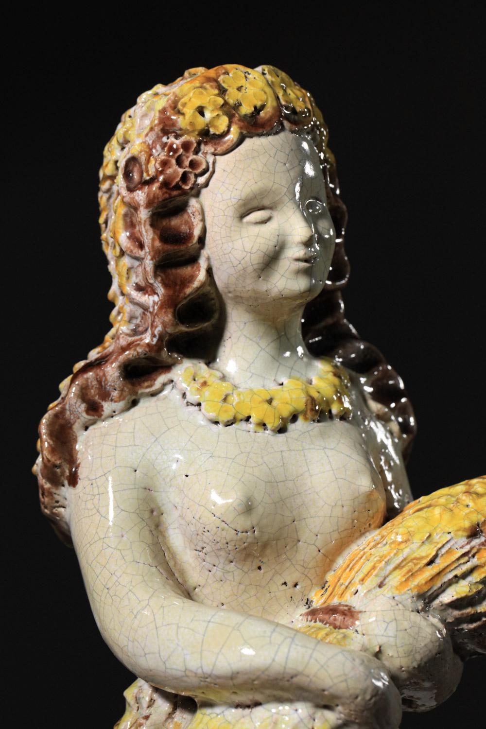 Ceramic goddess by Denise Picard from the Paul Pouchol workshop H687 
Large ceramic by the French artist Denise Picard signed by the Paul Pouchol studio in the 1940s. 
Glazed ceramic in shades of yellow and white depicting Ceres, the goddess of