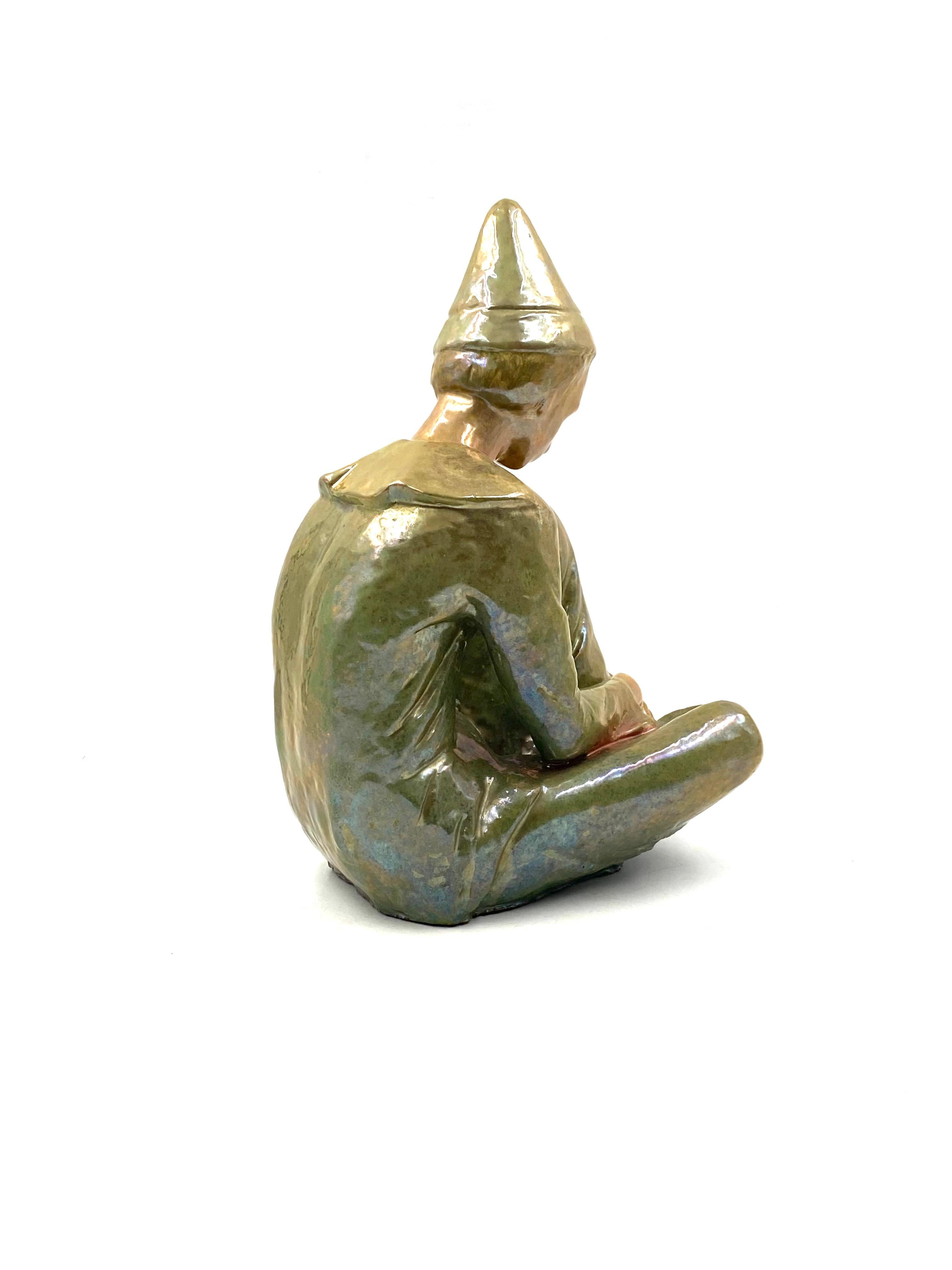 Ceramic green figure of Sitting boy, Giordano Tronconi, Faenza Italy, 1950s For Sale 9