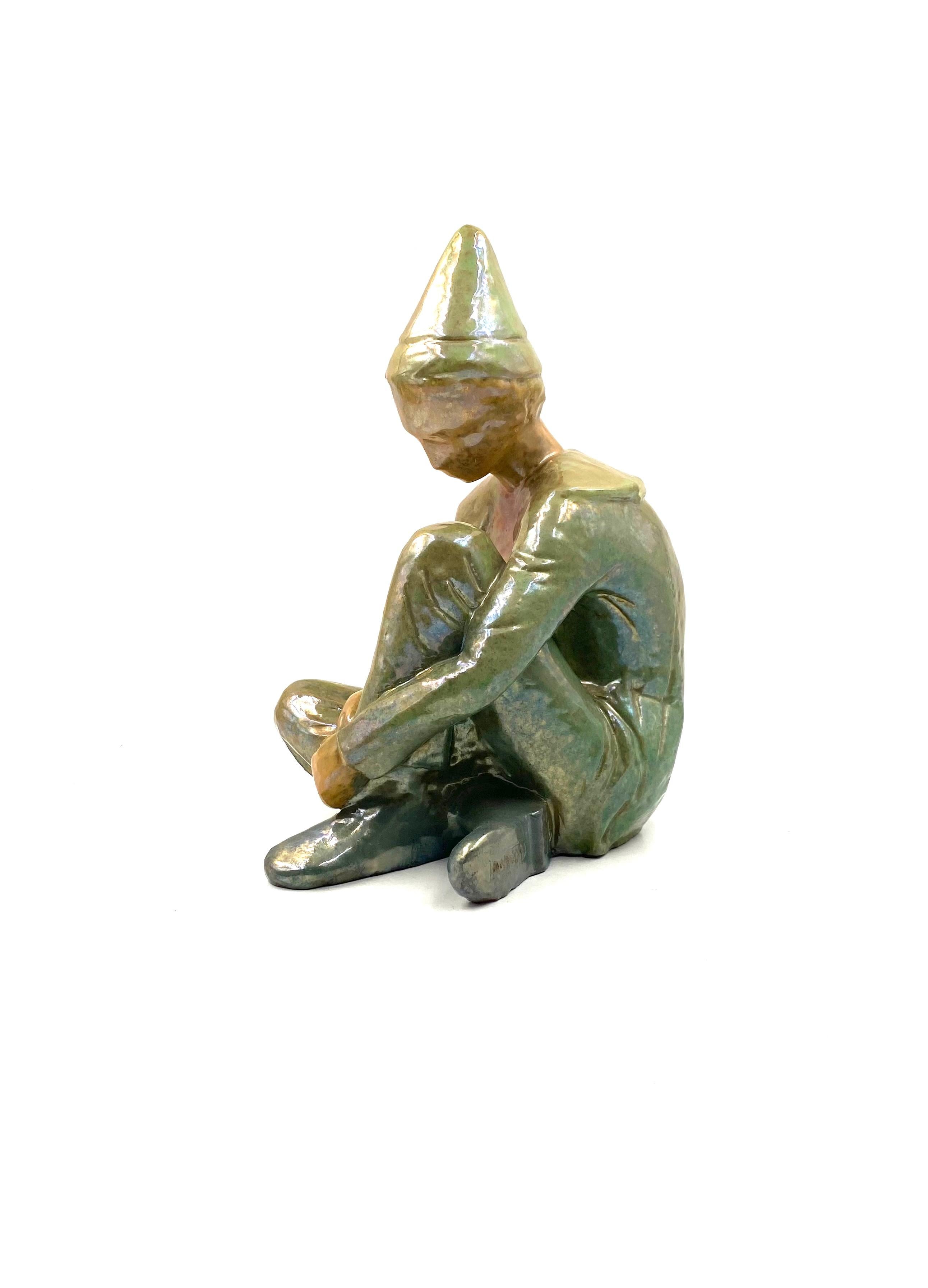 Ceramic green figure of Sitting boy, Giordano Tronconi, Faenza Italy, 1950s For Sale 1