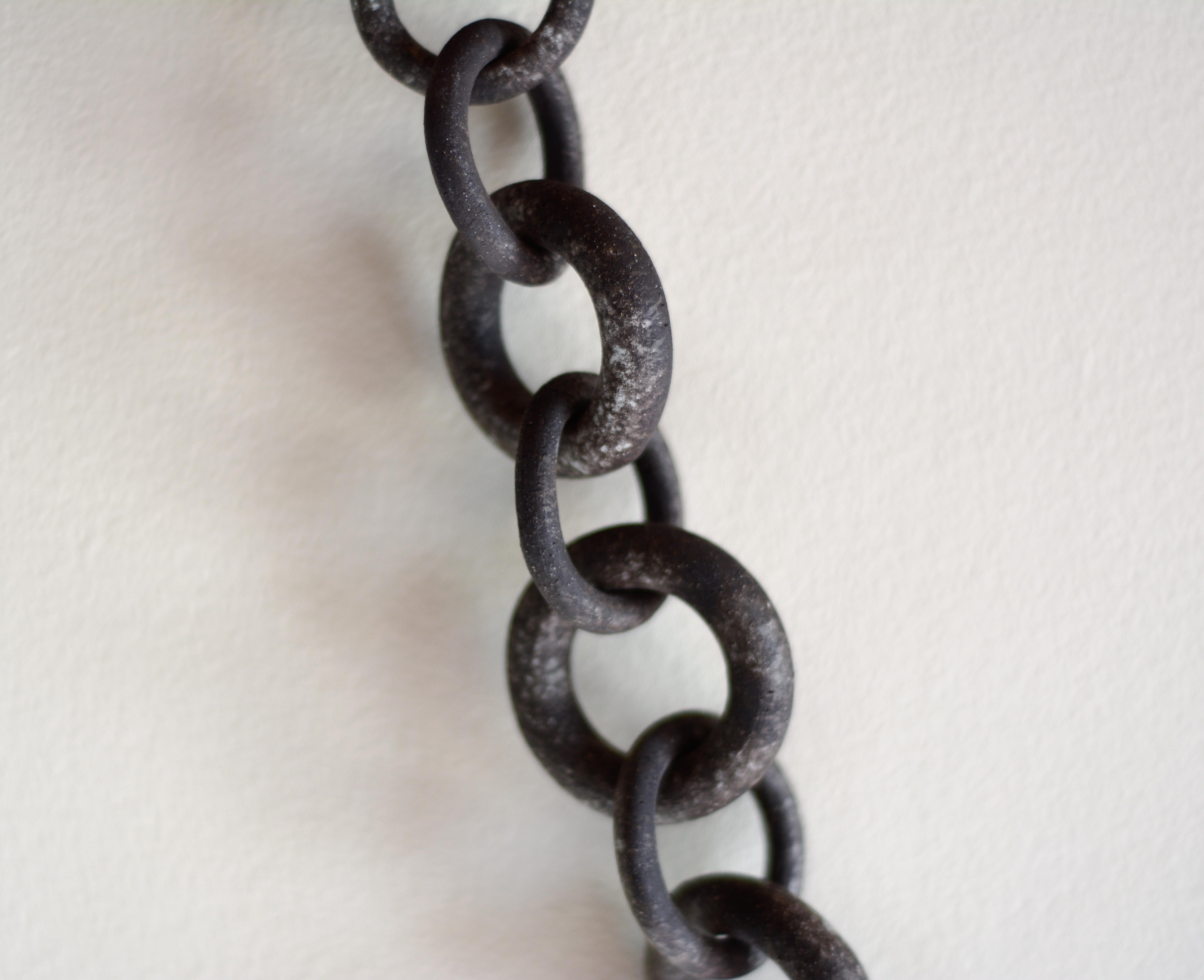 Ceramic Hand Link Chain Wall Sculpture by Asmaa Aman Tran 4