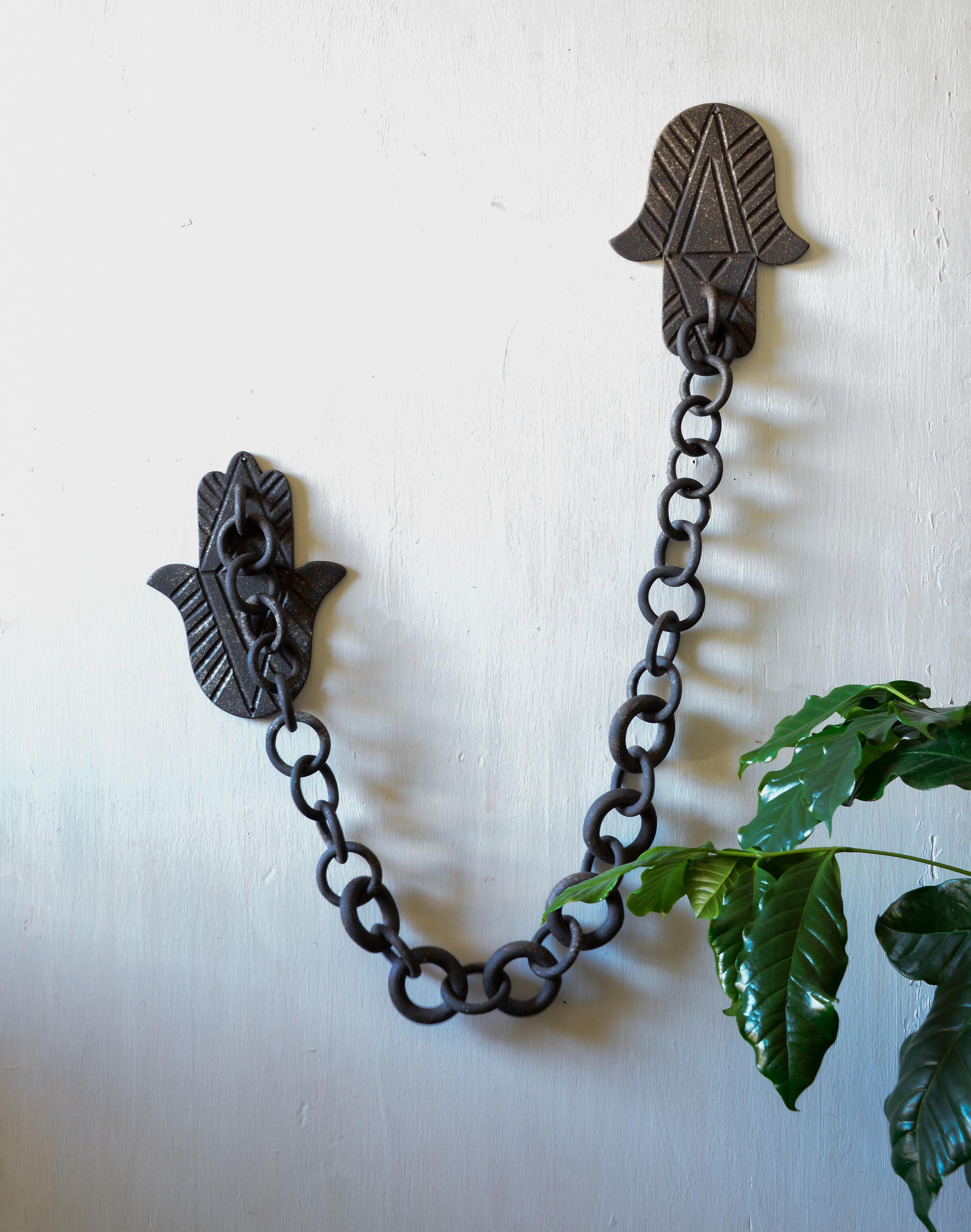 Ceramic Hand Link Chain Wall Sculpture by Asmaa Aman Tran 5