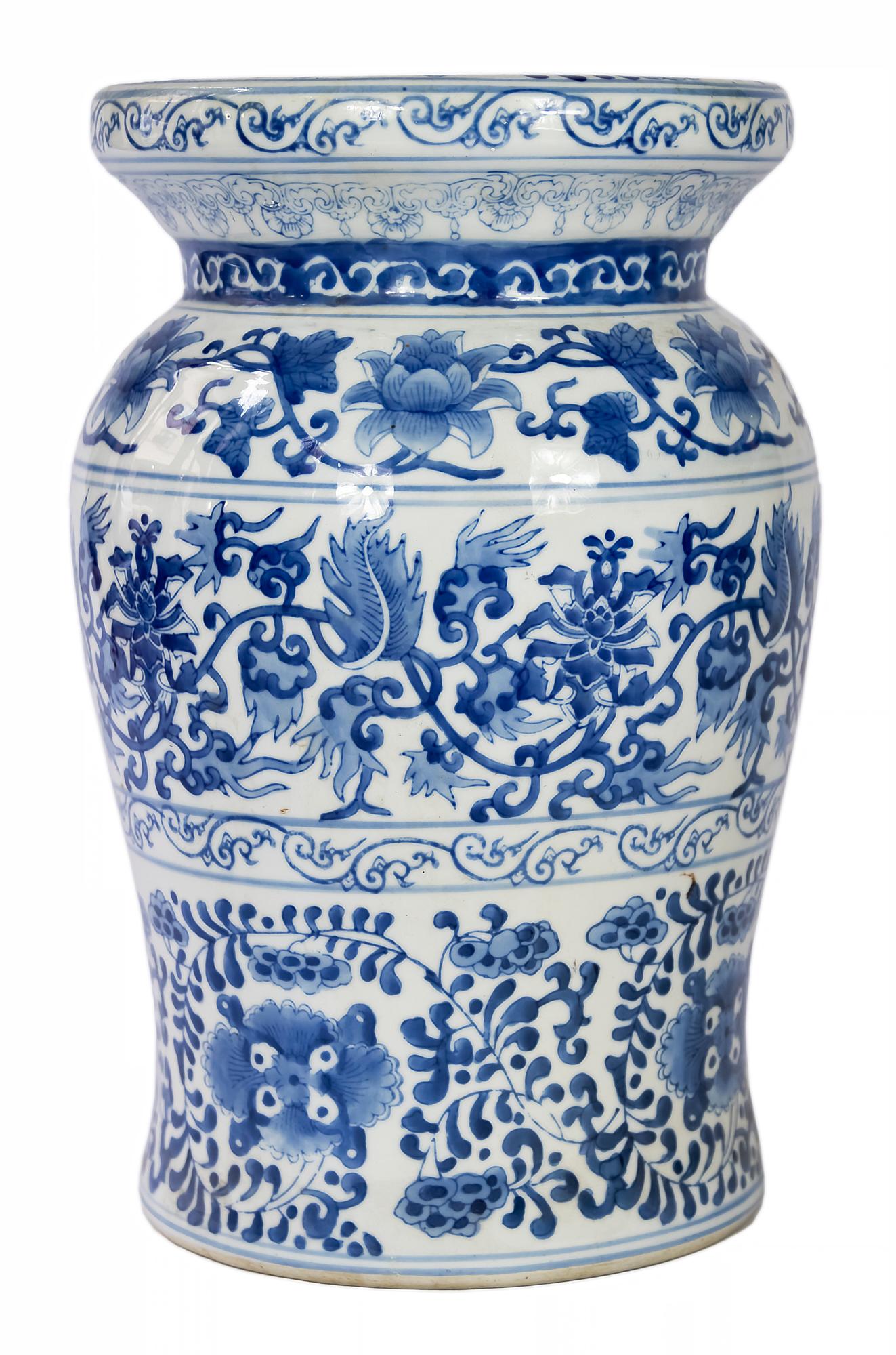 Chinese ceramic garden stool decorated in white and blue colours with glazed surface and circumferential hand painted decoration of the floral elements.

 
