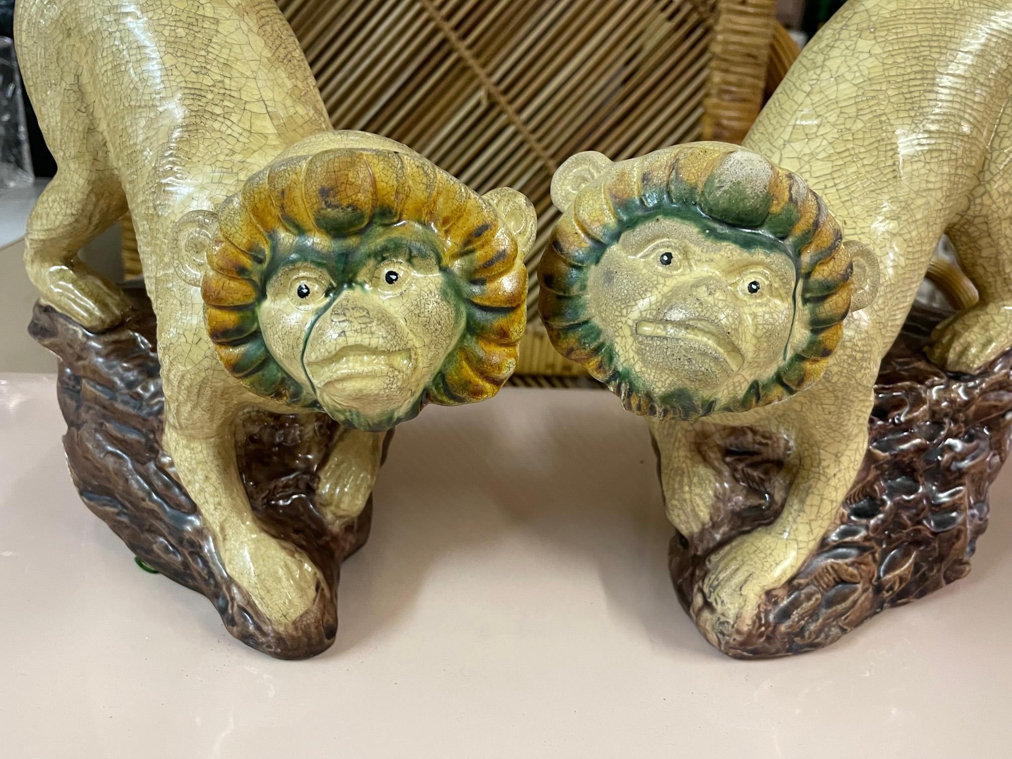 Vintage monkey figurines are hand painted and stand left and right facing. Even crazing throughout and original paint drips show wonderful age and patina. Perfect for display in any decor. Good vintage condition with imperfections consistent with