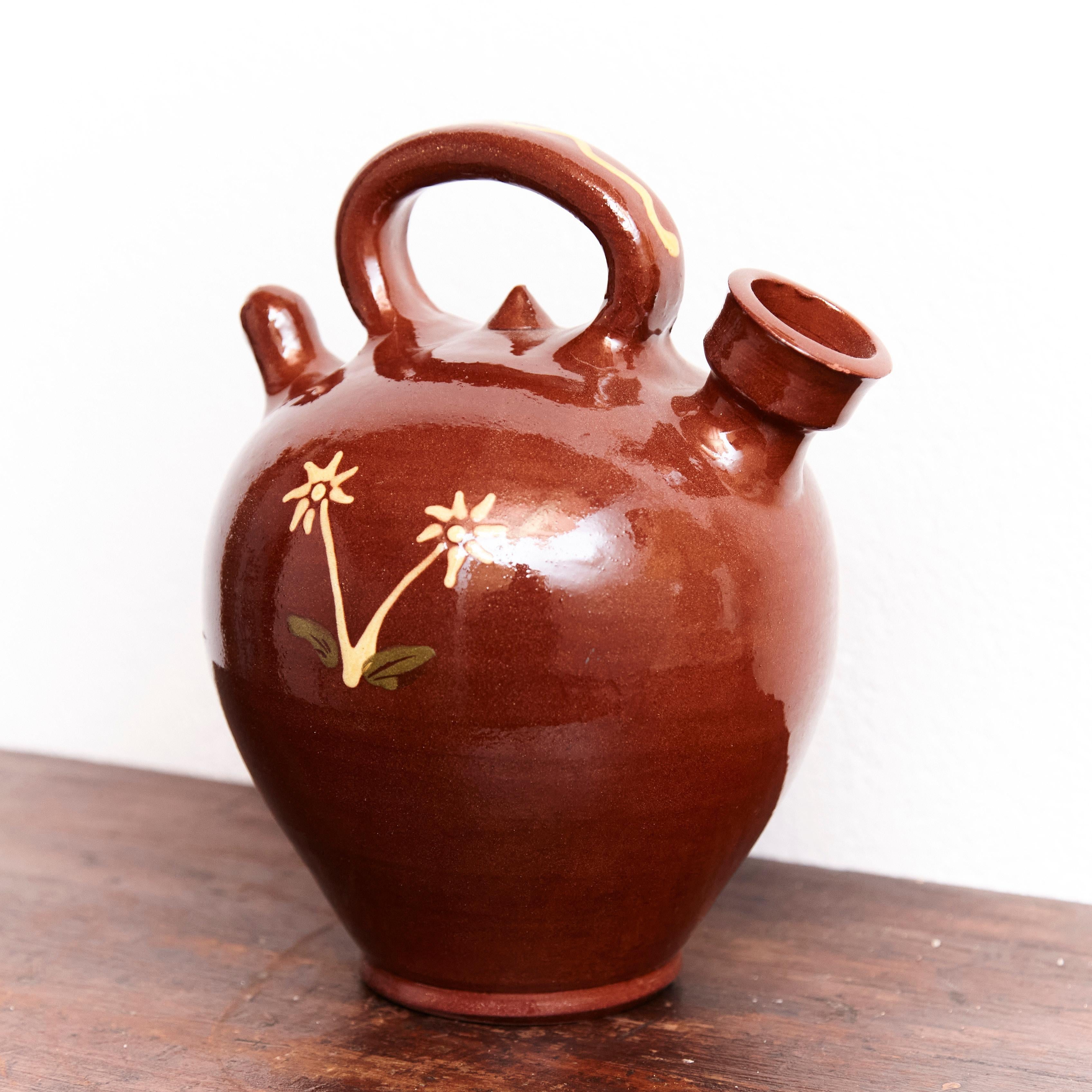 Traditional Spanish jug vase, circa 1960.  Manufactured in Spain.    In original condition, with minor wear consistent of age and use, preserving a beautiul patina.    Material:  Ceramic.
