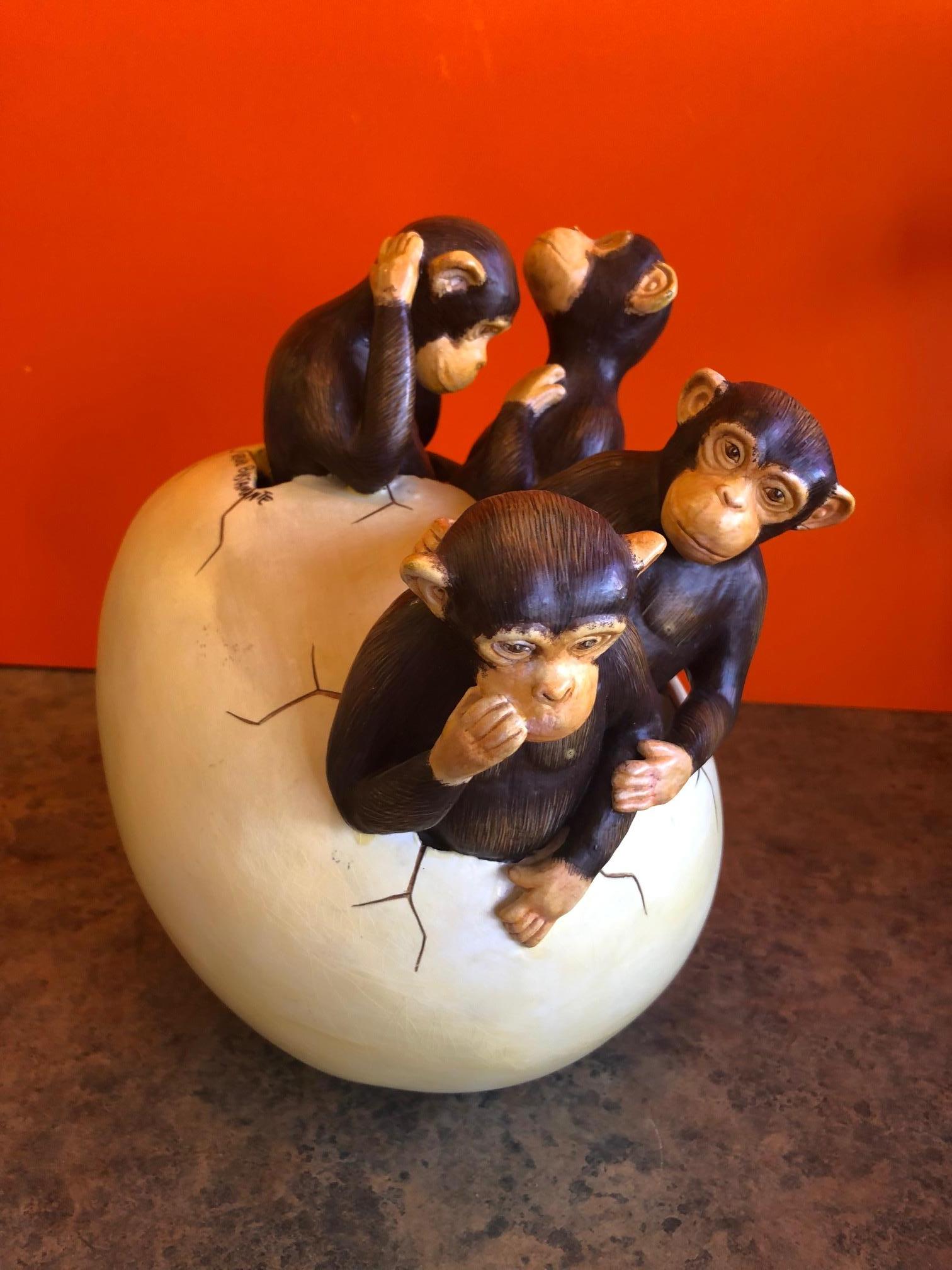 Fabulous ceramic hatching monkeys from egg sculpture by renowned Mexican artist, Sergio Bustamante, circa 1970s. The piece which is signed by the artist, depicts four baby monkeys hatching from an egg and is truly realistic with amazing