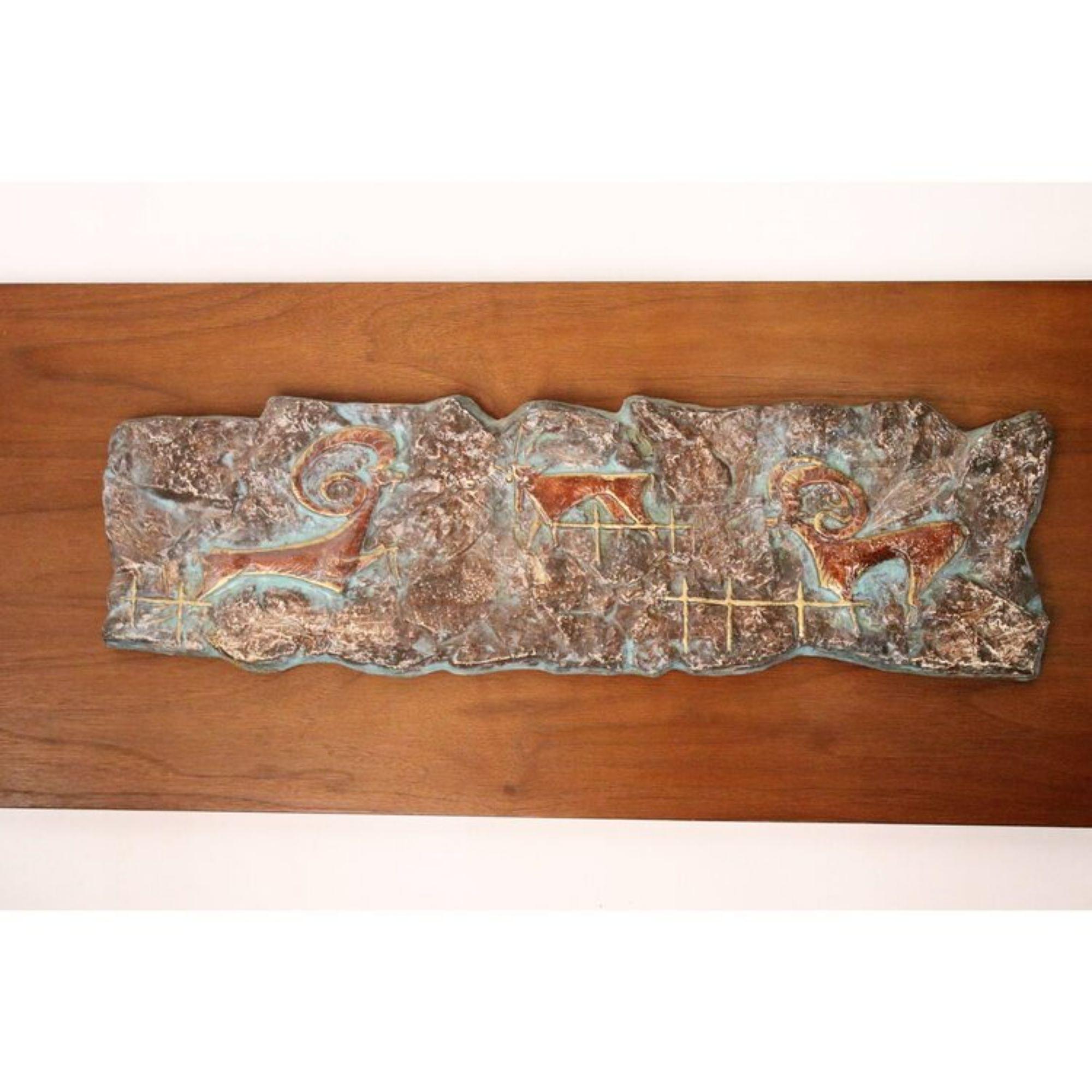 Mid-century glazed ceramic hieroglyphic relief on a walnut plaque. Ready to hang. Good Condition, Original Condition Unaltered, Some Imperfections. Excellent vintage condition.