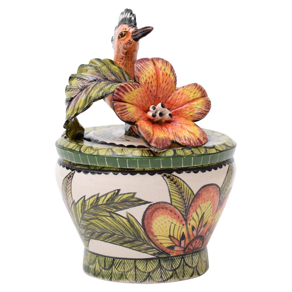 Crafted by Love Art Ceramics in South Africa, this exquisite Hoopoe Novelty Box is a tribute to African biodiversity. Hand-sculpted by Sondelani Ntshalintshali and adorned with intricate hand-painted details by Zinhle Nene, it stands 7 inches tall,