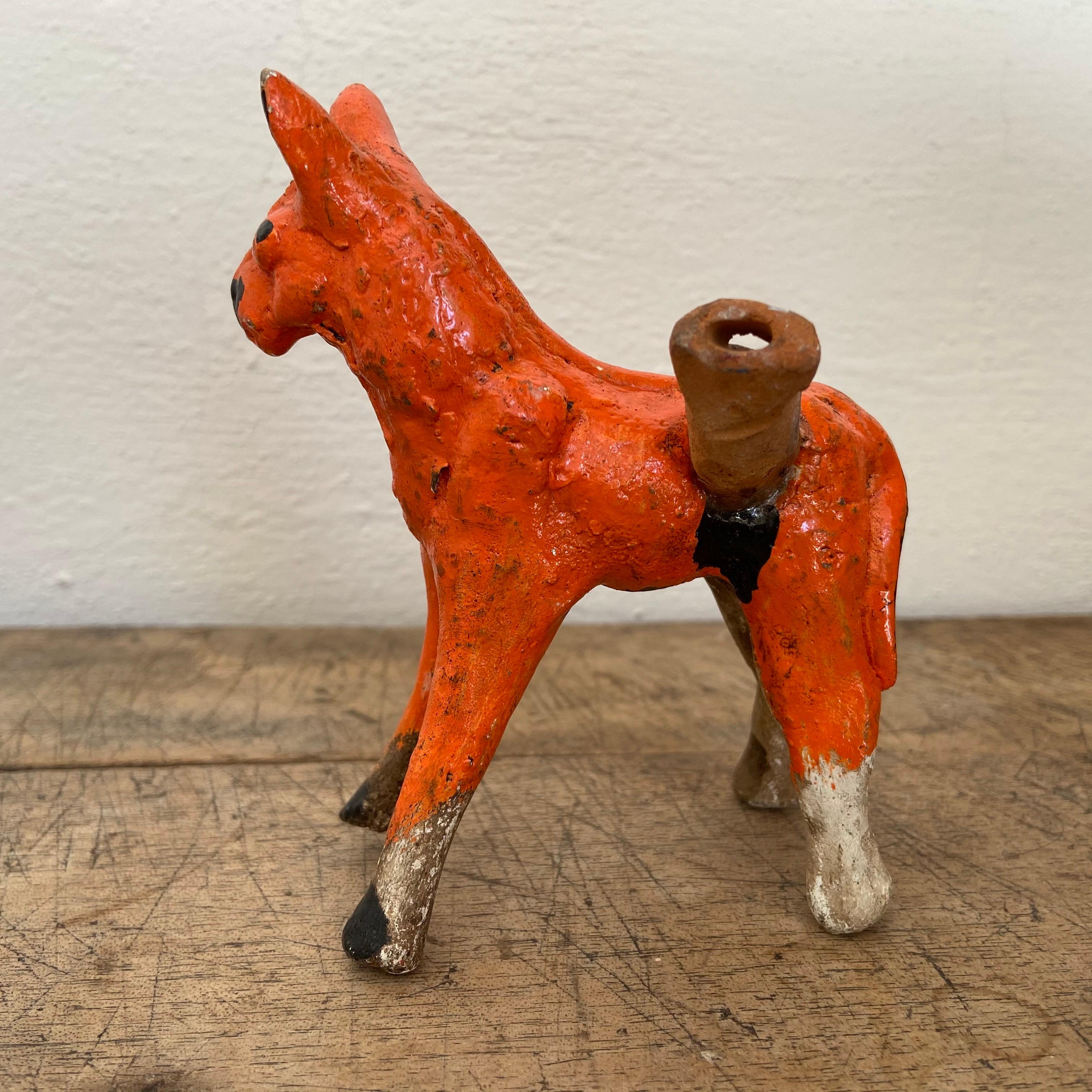 Orange and black glazed horse figure and whistle from Morelos, Mexico, 1980s. These Folk Art ceramic figures were available during traveling carnivals throughout Mexico in the early 1980s.