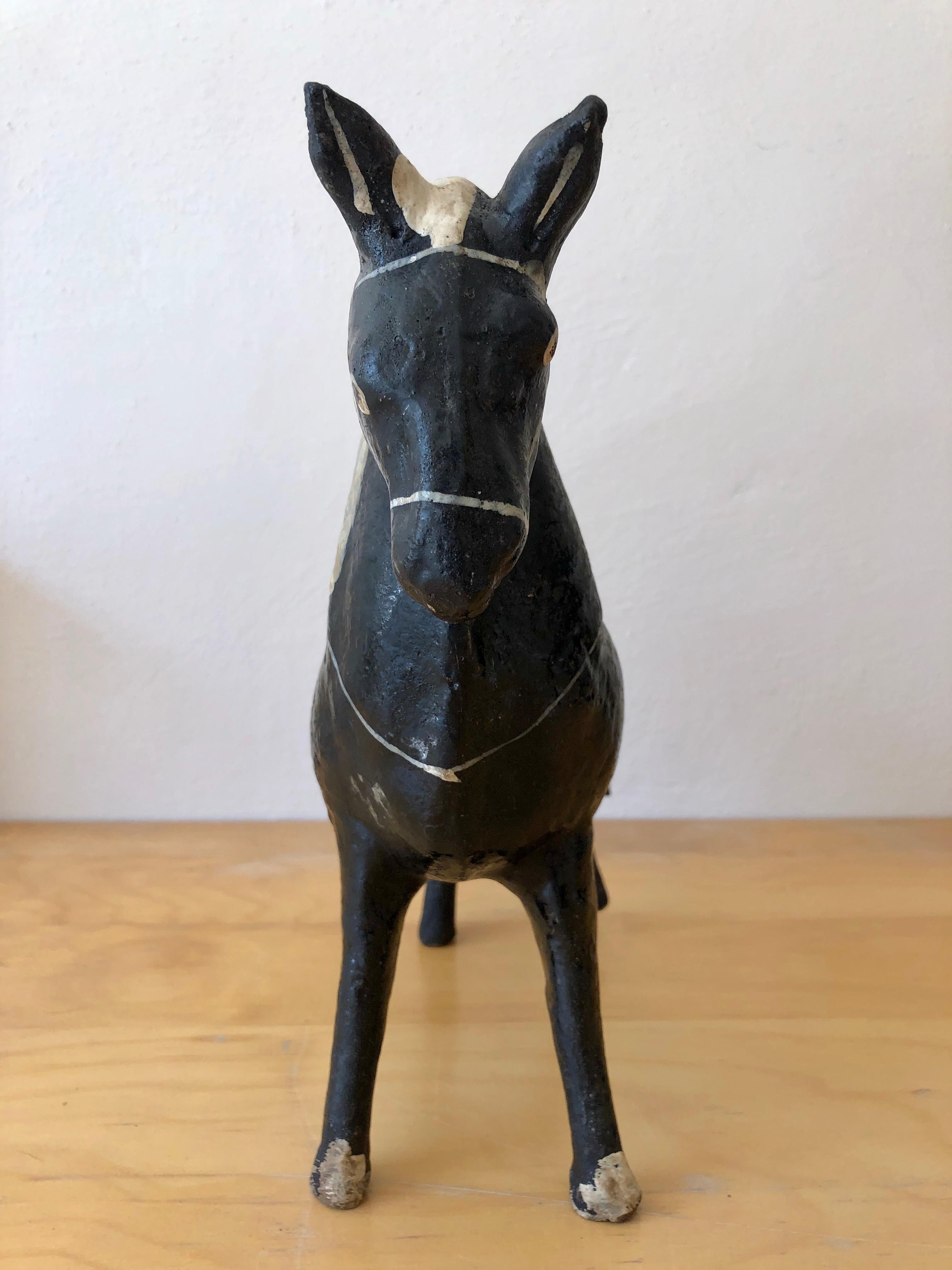 Black and red horse piggy bank from the border area of the state of Mexico with Guerrero. Classic Folk Art ceramic pieces that are hard to come by given their fragile nature, circa 1980s.