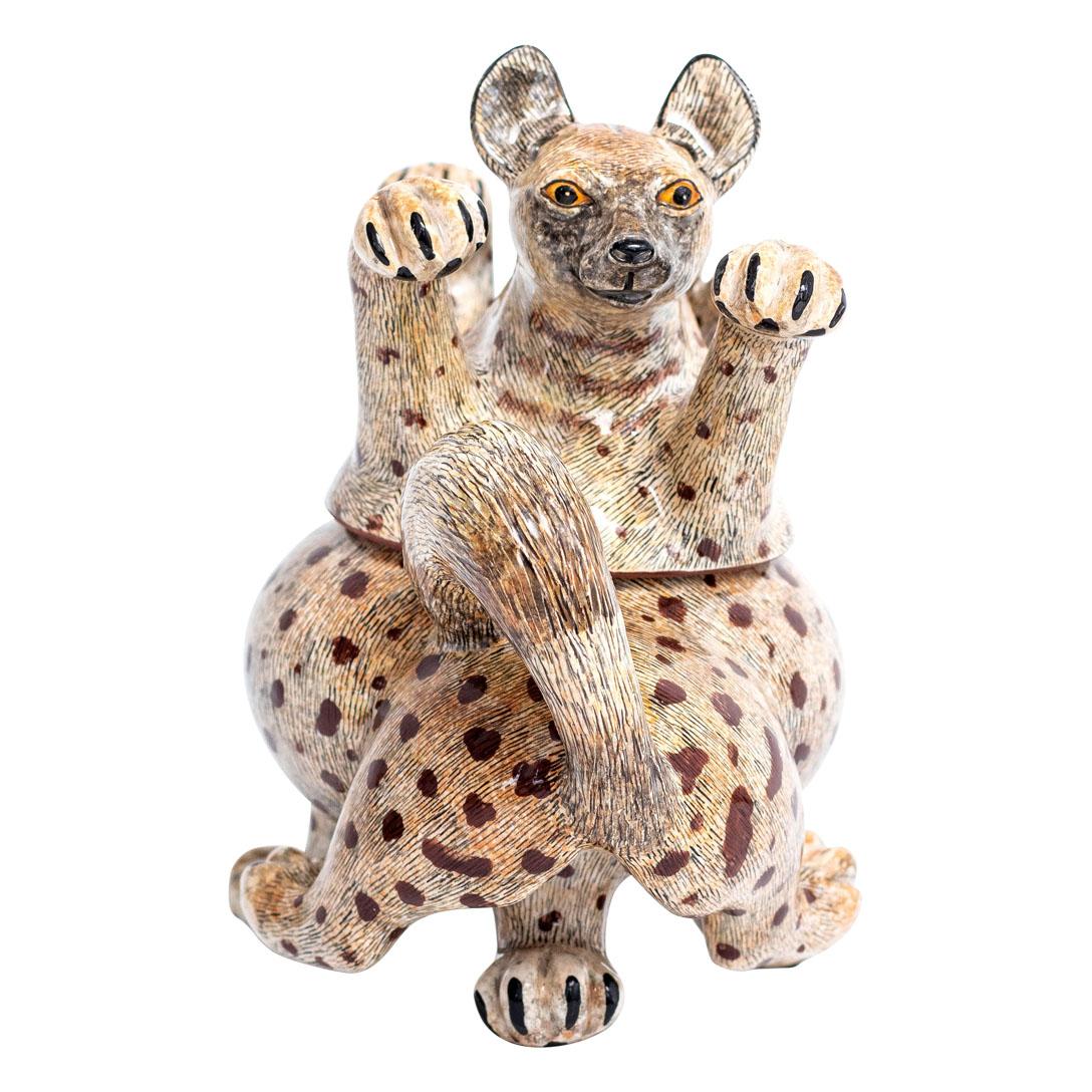 Hyena Jewelry Box
Hand-Painted by Jabu Nene, Sculpted by Unknown
Love Art Ceramic, South Africa, 2023

The Hyena Jewelry Box is a striking piece of ceramic art that captures the essence of one of Africa's most intriguing animals. Measuring 6 inches