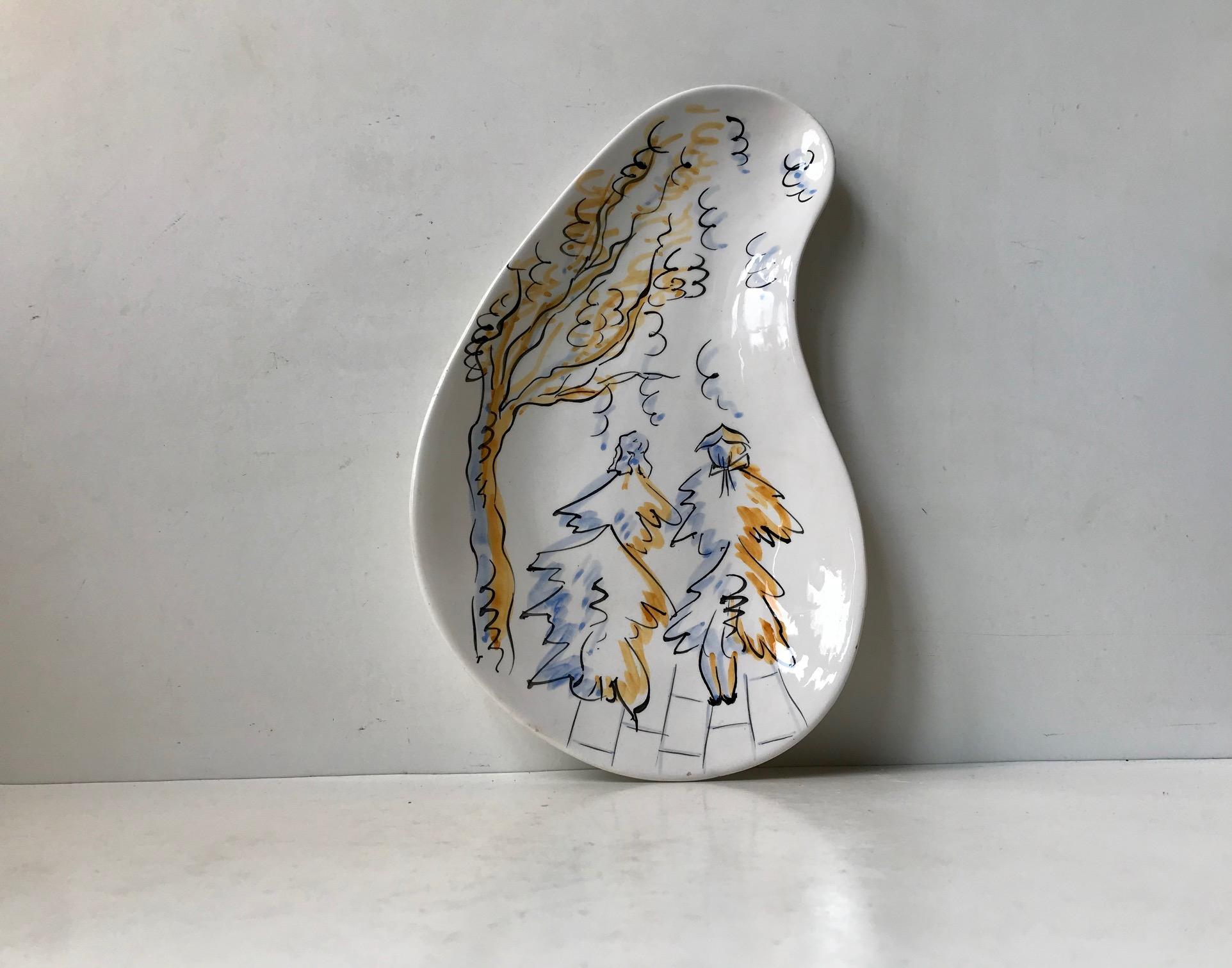 Kidney shaped ceramic art dish with a scenic motif of two persons. Style abstract expressionism. Designed and manufactured anonymously in Italy during the 1950s. It is numbered 236 and marked Made in Italy.
