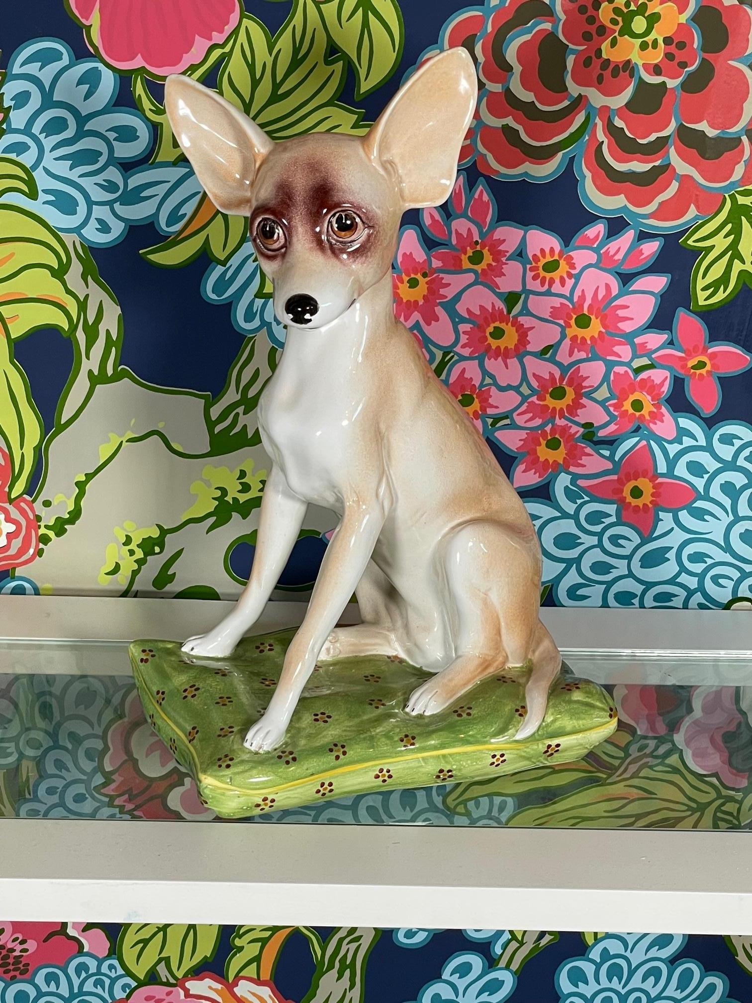 Vintage Italian ceramic dog figurine features our cute long-eared friend sitting atop a comfy pillow. Ready to enhance the decor of his new home. Good condition with only minor imperfections consistent with age (see photos).

    