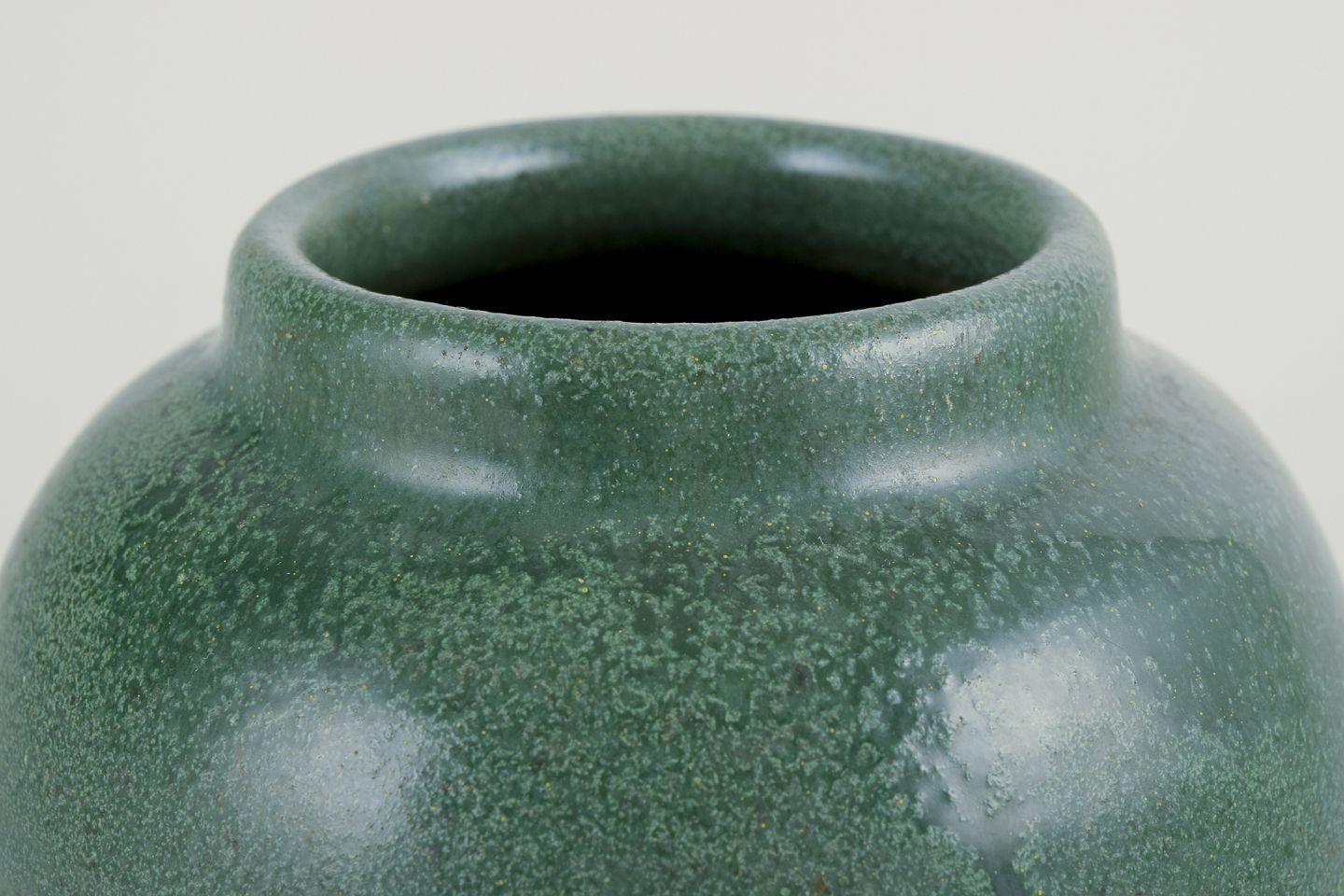 Glazed Ceramic jar glazed in green hues. With a brass and bronze lid. For Sale