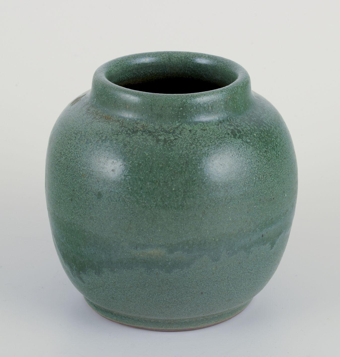 Ceramic jar glazed in green hues. With a brass and bronze lid. For Sale 2