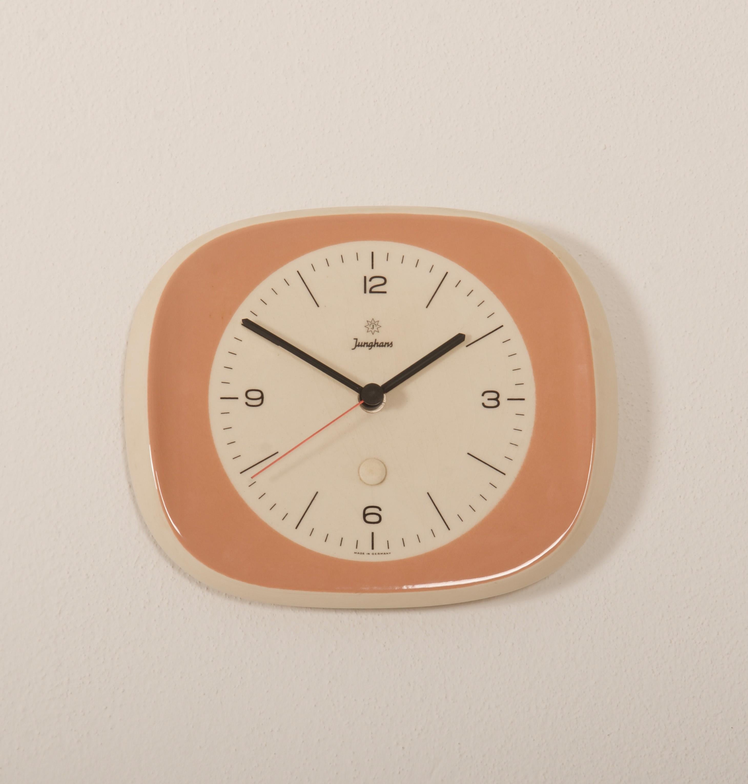 Ceramic wall clock designed in the 1950s by Max Bill for Junghans. Fitted with a battery movement.
