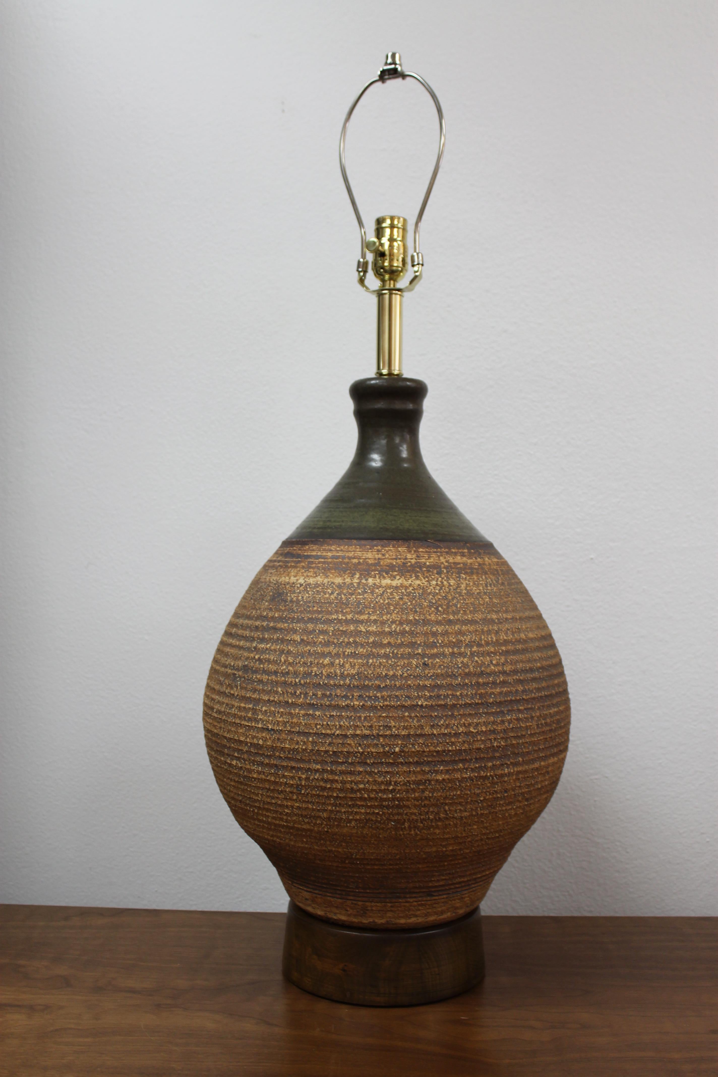 Ceramic lamp by Bob Kinzie for the Affiliated Craftsmen Lamp Company of Costa Mesa, CA. Ceramic portion is 19.5” high and 13.5