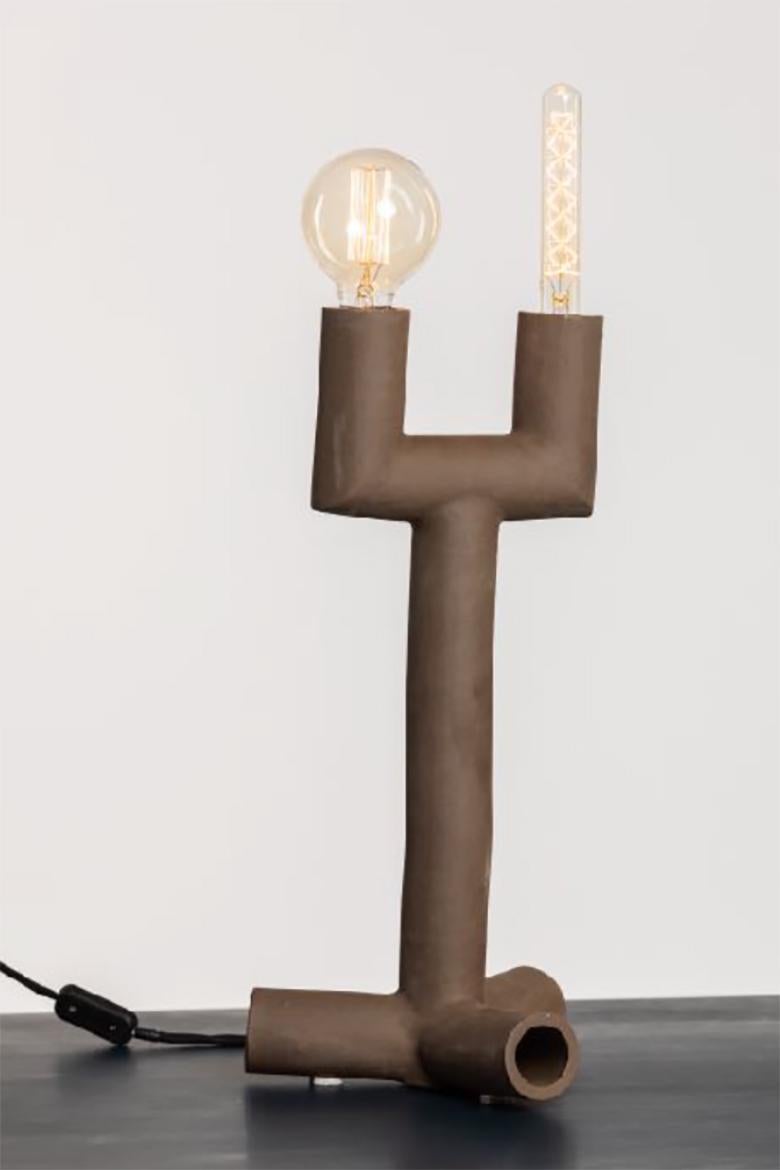 Ceramic lamp - large by Milan Pekar
Dimensions: 25 x 25 x 40 cm
Materials: Ceramic

Hand-made in the Czech Republic. 
Also available in different colors.

All our lamps can be wired according to each country. If sold to the USA it will be