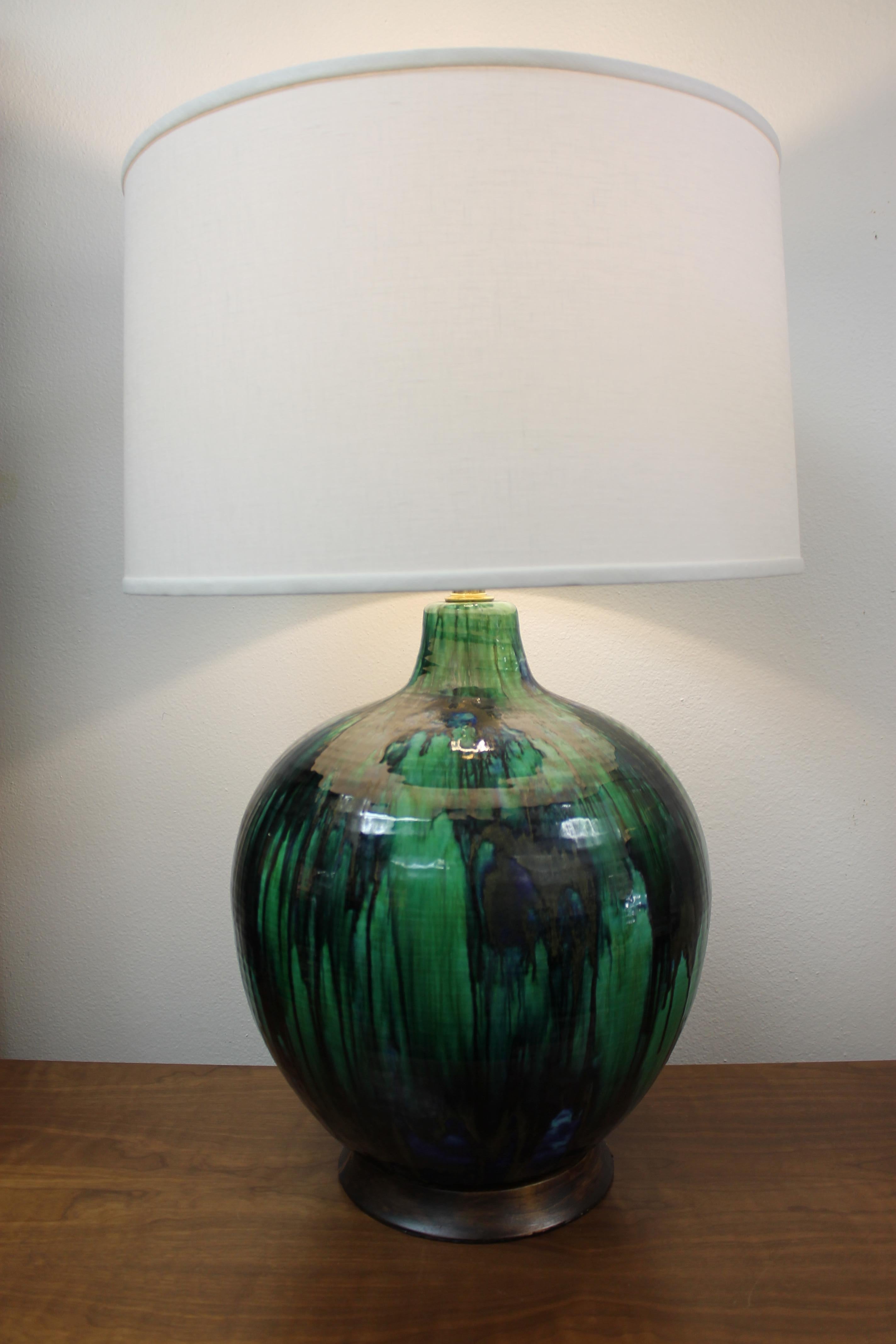 Monumental ceramic lamp consisting of green, black and blues. Ceramic portion is 18.5