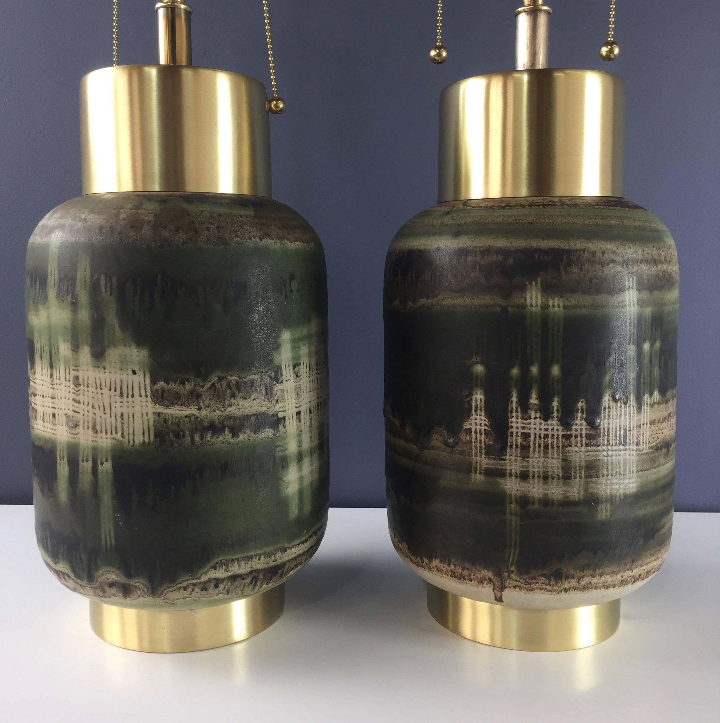 These beautiful Lamps with their striking glaze have had the brass polished and lacquered and have been rewired. They have been attributed to both Design technics and Maria Von Allesch.

Lee Rosen for Design Technics worked in the same period as