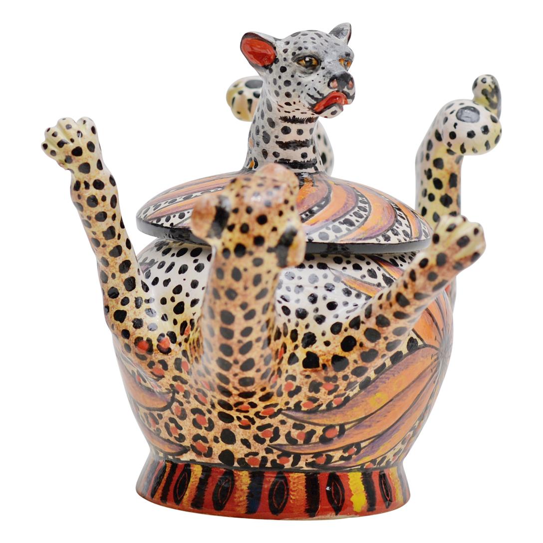 Leopard Jewelry Box: Hand-Painted by Winnie Nene and Sculpted by Sondelani Ntshalintshali

The Leopard Jewelry Box is a striking example of South African ceramic artistry, masterfully crafted by Love Art Ceramic. Hand sculpted by the talented