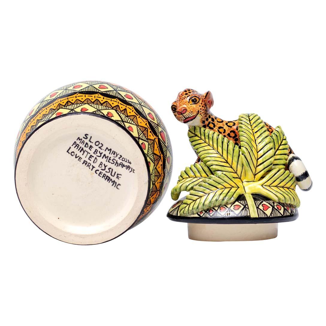 Leopard Jewelry Box
Hand-Painted by Slindelo Mazibuko, Sculpted by Motsamai Sello
Love Art Ceramic, South Africa, 2024

Introducing the Leo Jewelry Box, a charming ceramic piece that embodies the beauty and spirit of South Africa’s wildlife.