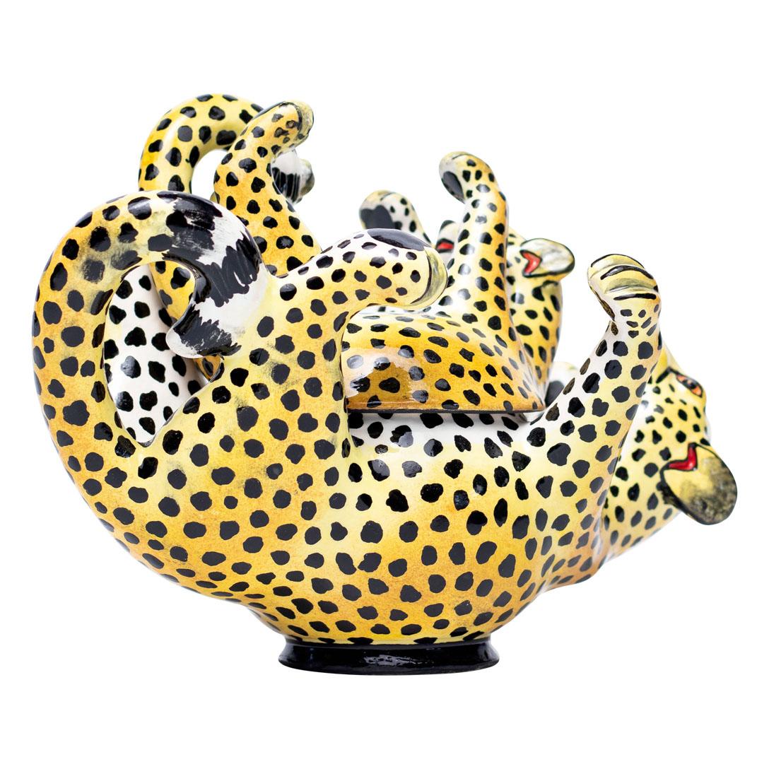 Leopard Jewelry Box
Hand-Painted by Swelihle Khanyeza, Sculpted by Sfiso Mvelase
Love Art Ceramic, South Africa

Introducing the Leopard Jewelry Box, a striking piece of ceramic art that celebrates the beauty and elegance of one of Africa’s most