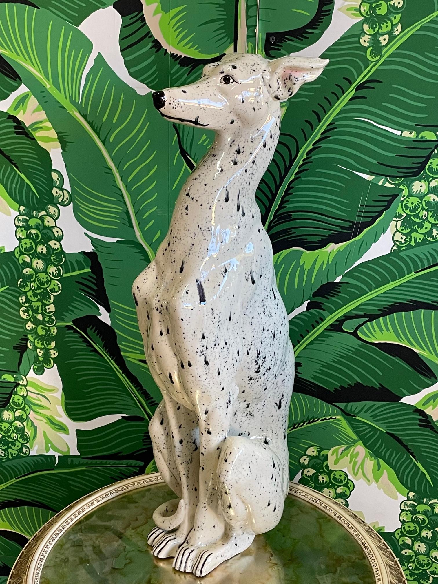 Life size ceramic dog statue features hand painted finish and heavy gloss. Either a whippet or an Italian greyhound. Stands 28