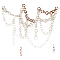 Sculpture murale à maillons en céramique