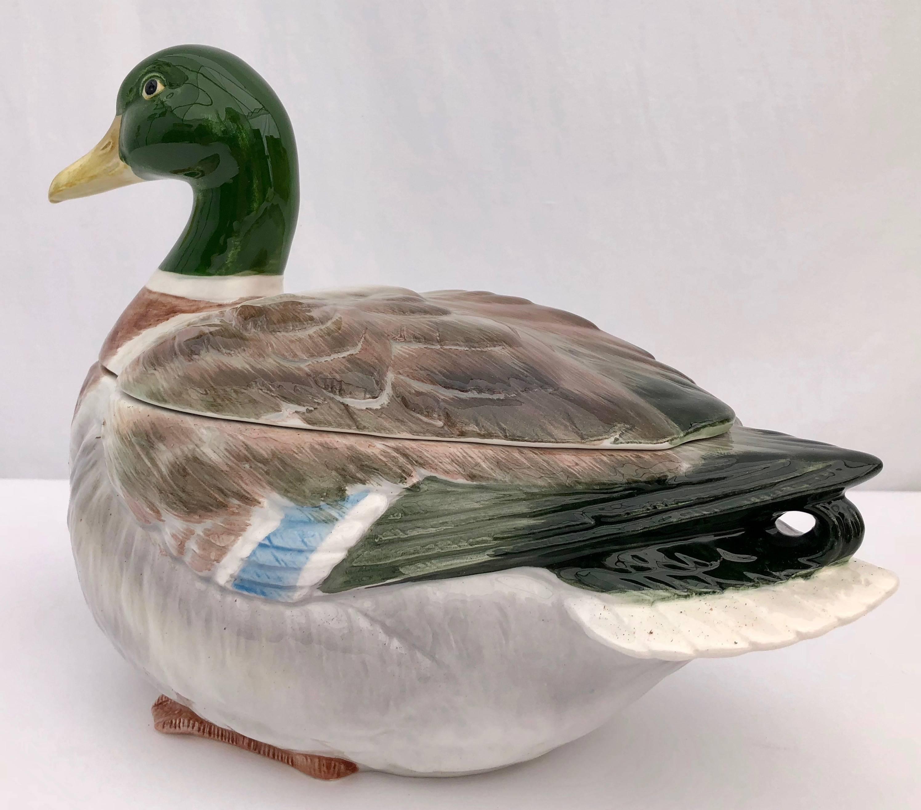 This is a handcrafted fantastic ceramic mallard cookie jar, by Otagiri, Japan. It was purchased for a French restaurant, but never used. It comes in its original box. The hand painted colors are vibrant. This would add a wonderful touch to any