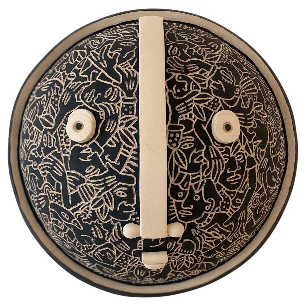 Decorative mask in clay, handmade by French ceramicists Dalo in collaboration with French woman artist Semilu.
One of a kind, signed both by Dalo and Semilu. 2023
Diameter 35 cm