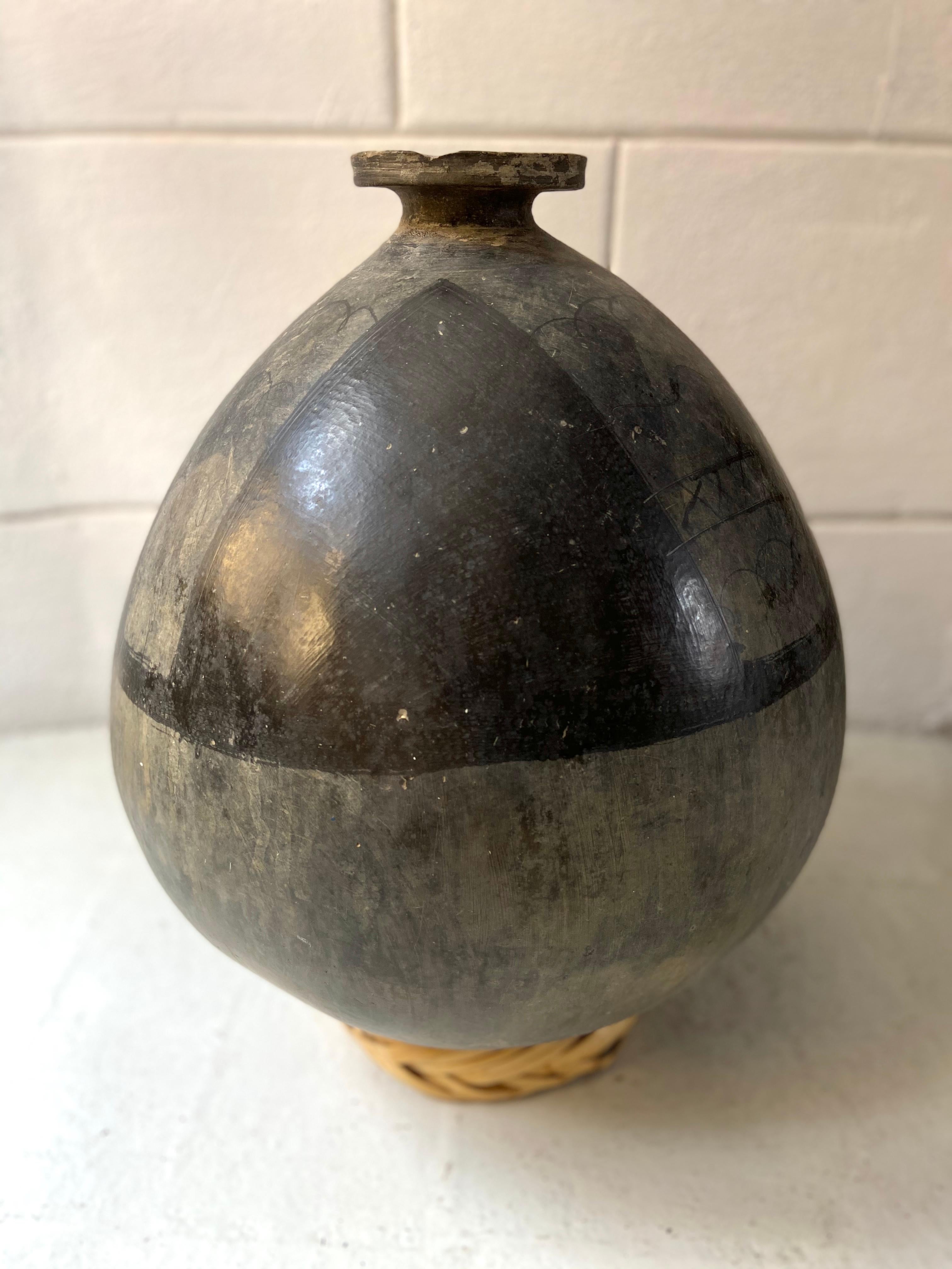 Ceramic mezcal vessel from San Bartolo Coyotepec, Oaxaca, 1950s. These black clay pots being only 1/8