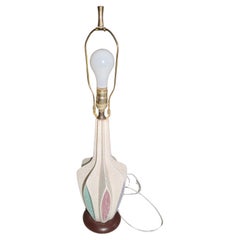 Ceramic mid-century table lamp with multi-color accents.