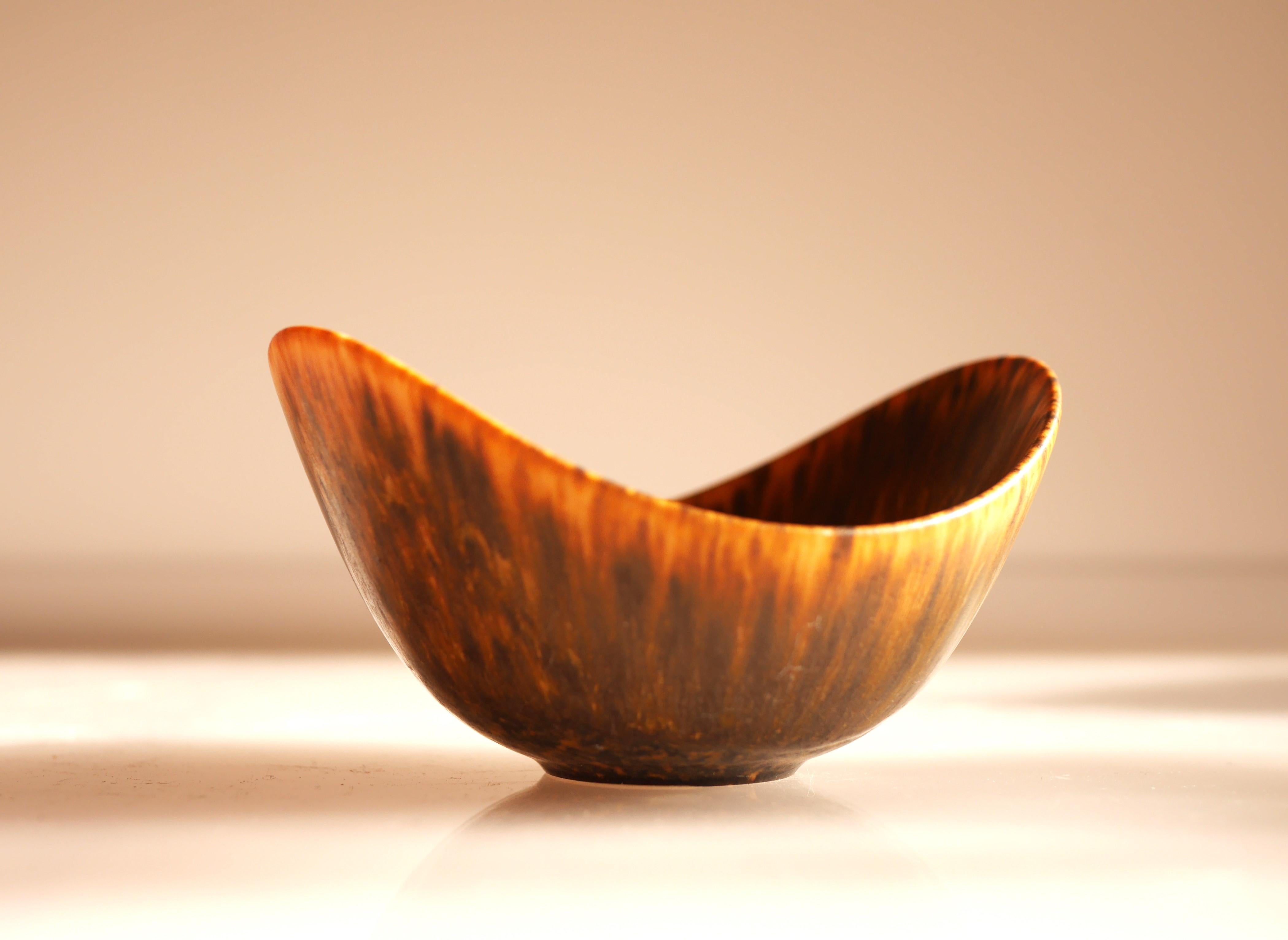 A stunning hand-made vintage miniature stoneware pottery bowl with a classic design known as 