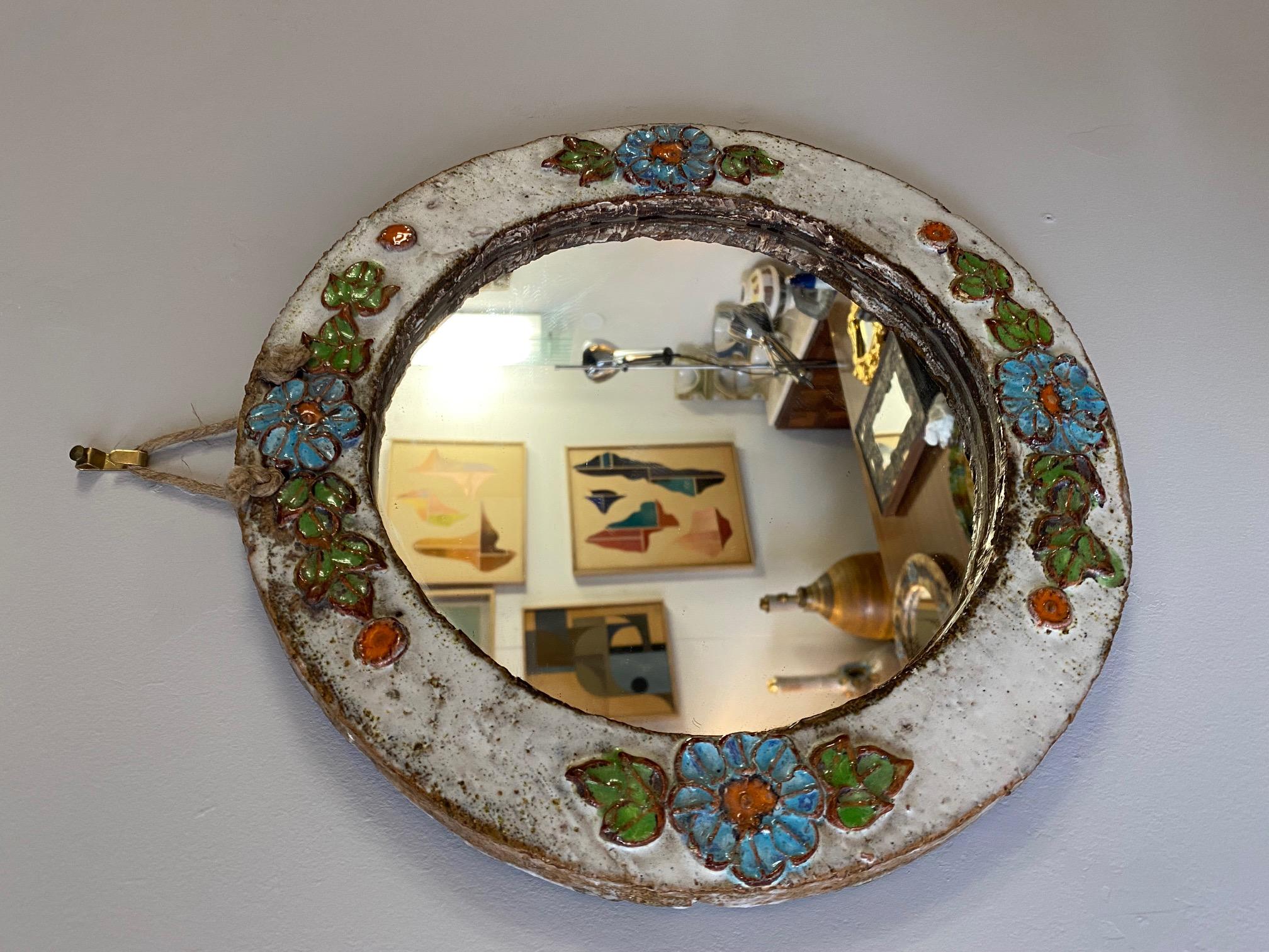 Ceramic mirror by La Roue Vallauris, France, 1960s
This company opened in 1962 and was run by Alexandre and Betty Fadas. La Roue was an outlet which sold ceramics in the town of Vallauris.