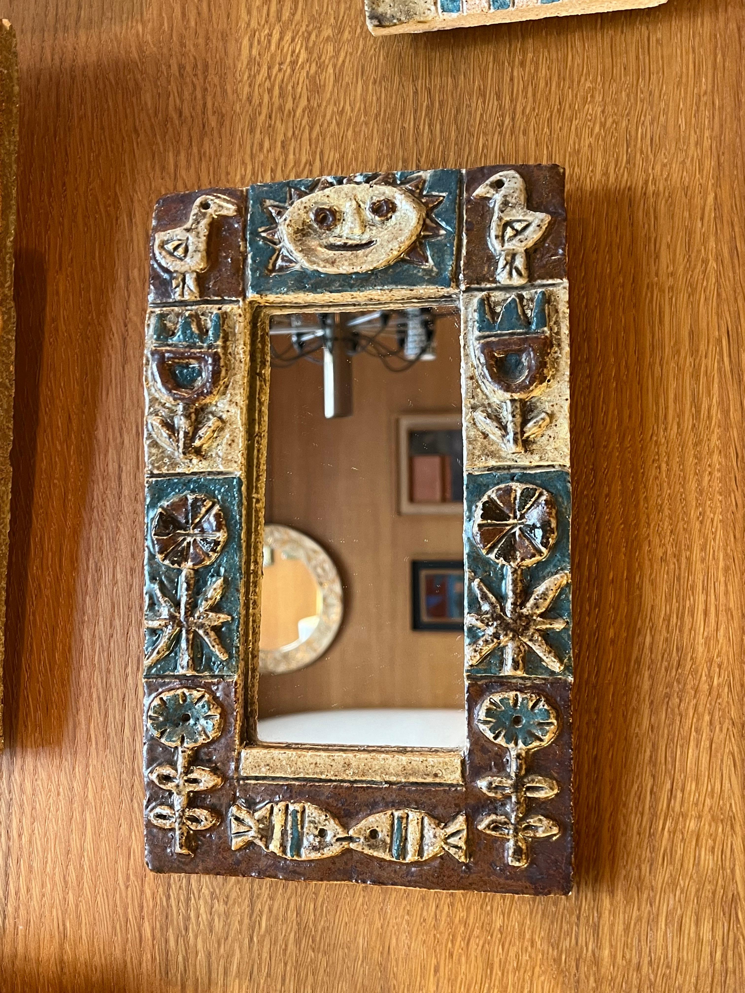 Ceramic mirror by Les Argonautes
1960's
Signed on the back