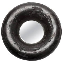 Ceramic Mirror with black glaze decoration by Mia Jensen.