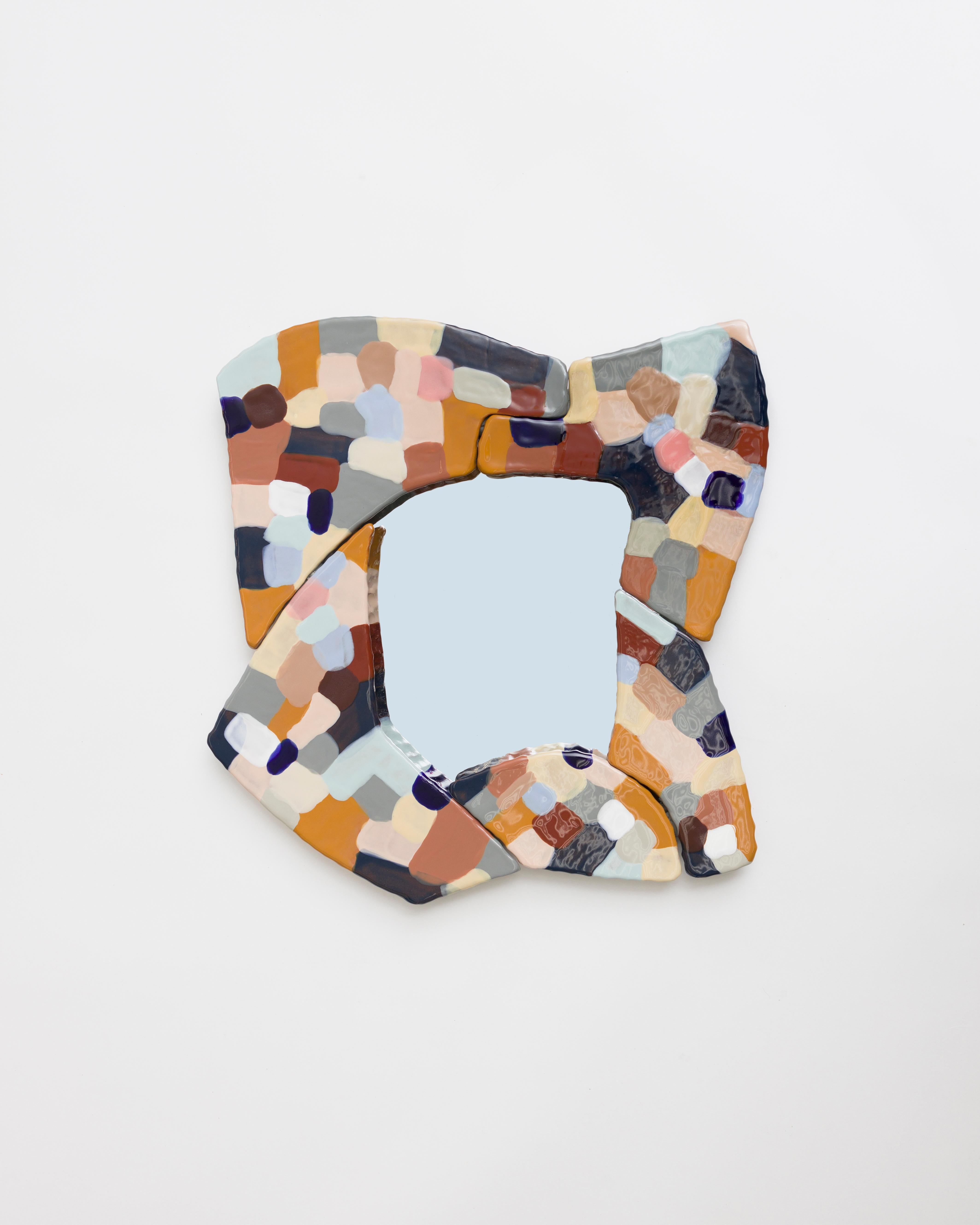 Sean Gerstley's patchwork glazed ceramic mirror. Created from what the artist describes as 