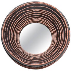 Ceramic Mirror with pink and brown glaze decoration by Mia Jensen.