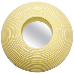 Ceramic Mirror with yellow glaze decoration by Mia Jensen.