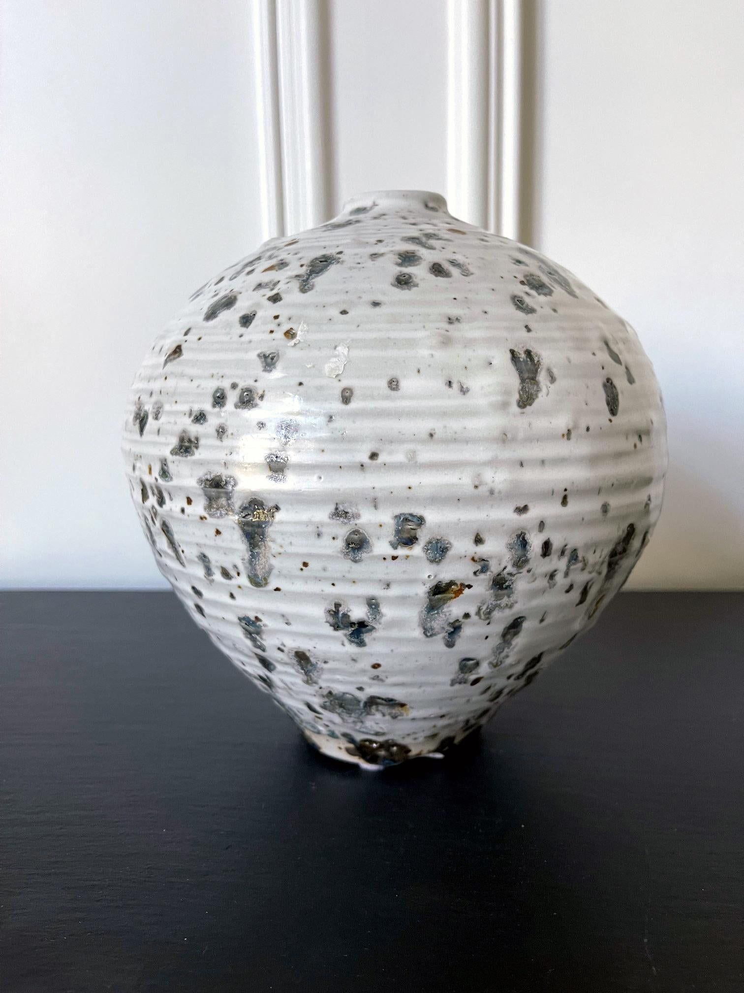 A ceramic vase in the form of a 
