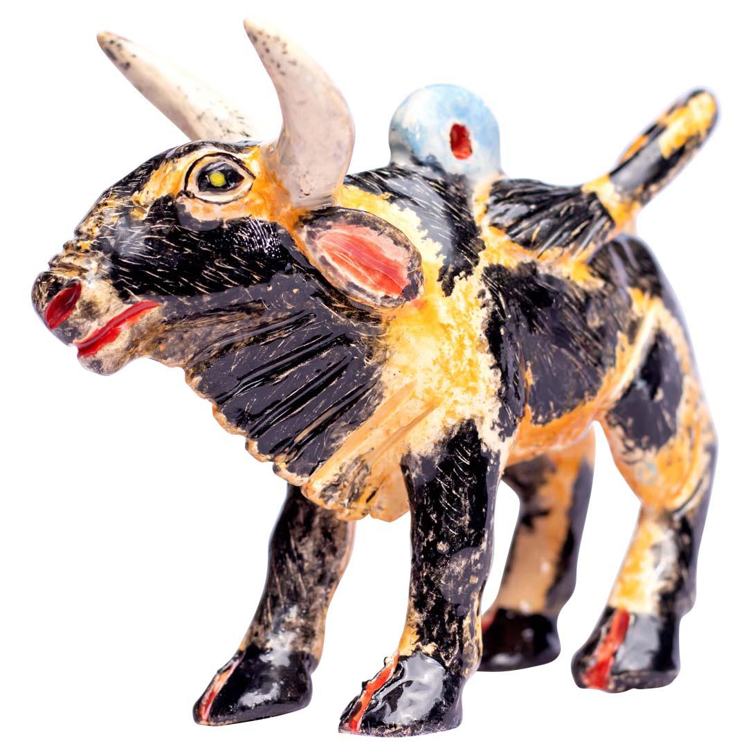 This vibrant ceramic Nguni ornament, crafted by Zimele Ceramics in South Africa, is a detailed tribute to the beloved Nguni cattle, skillfully hand-sculpted by Mbeke and vividly painted by Sihle. Measuring 3 inches high, 4 inches in length, and 2