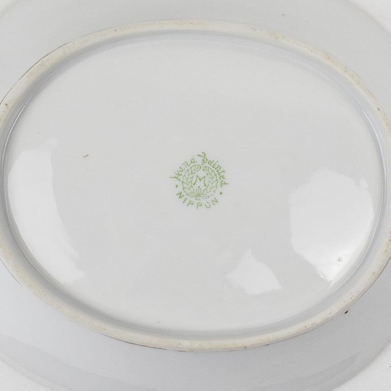 Ein seltener Fund: Diese dekorative ovale Nippon-Kanne der Gebrüder Morimura ist ein fabelhaftes Beispiel für frühe japanische Keramiken. Diese hübsche Keramikschale für Kleingeld oder andere Dinge ist eine fabelhafte Chintz-Ergänzung für jeden