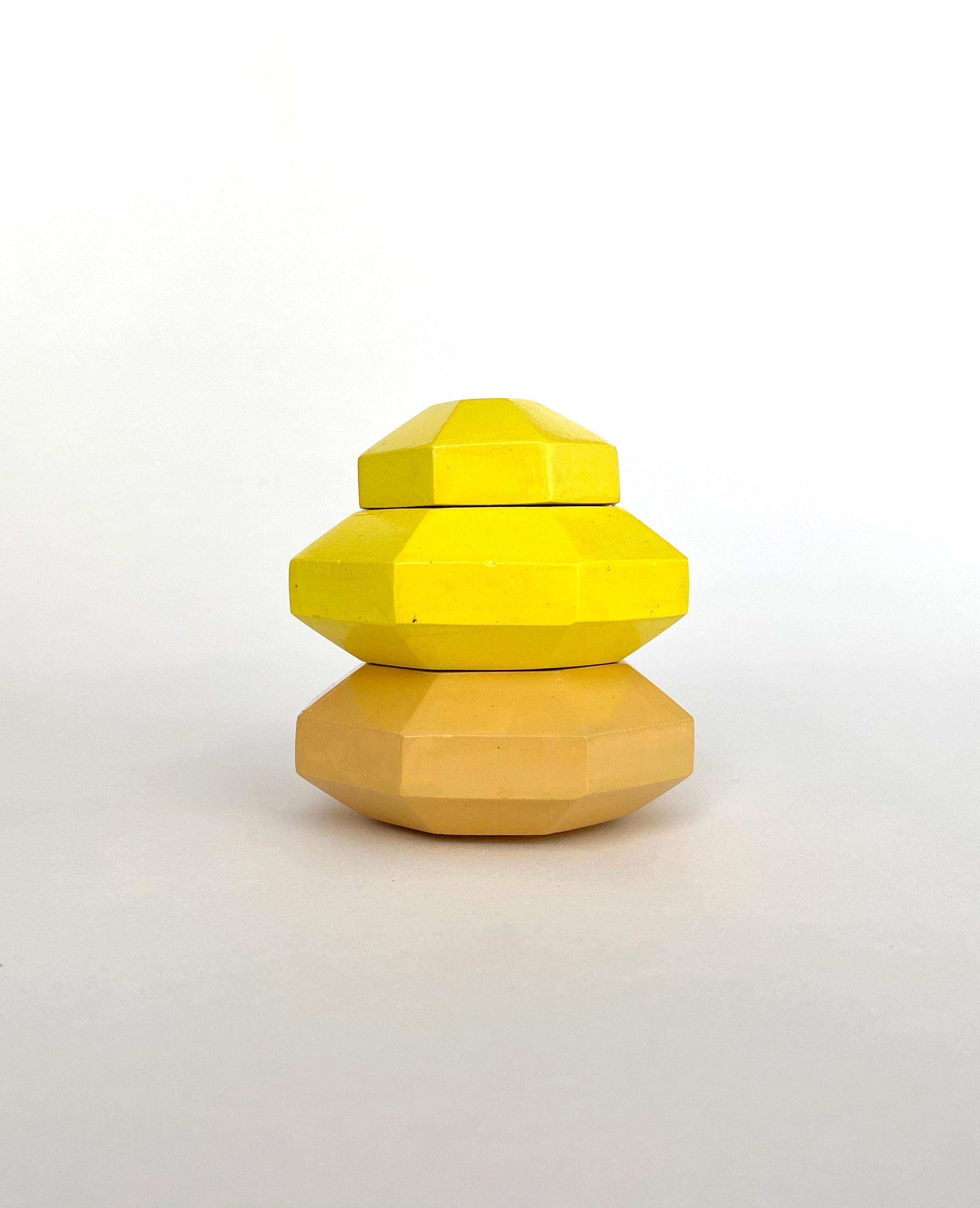 Ceramic nomad jar disco tower by Gilles & Cecilie
Unique
Dimensions: H 8 x W 7.5 cm
Material: Ceramic painted two tone yellow

Gilles and Cecilie Studio created the Nomad Jar Family to explore drawing in three dimensions. The series of objects