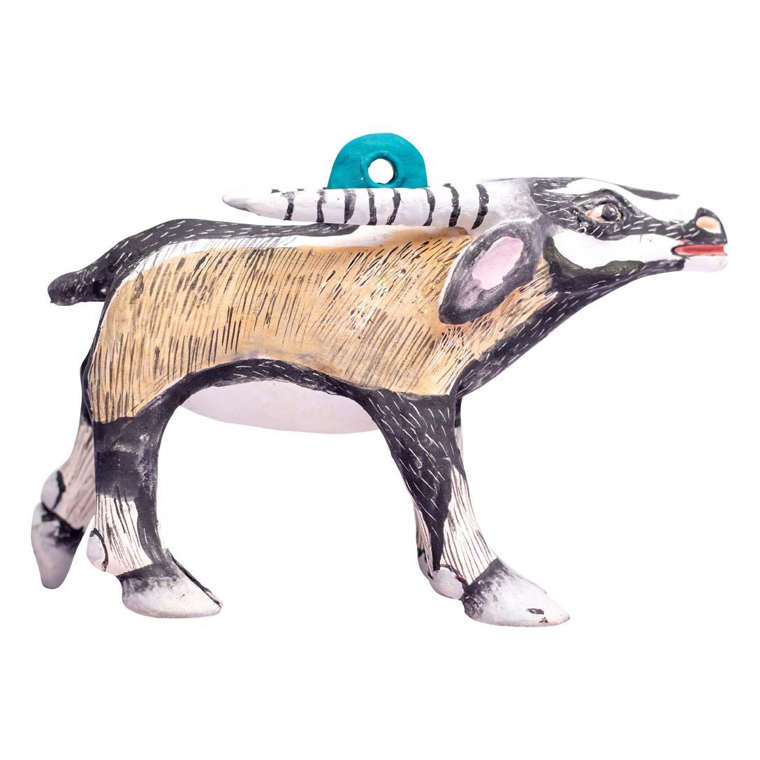 This ceramic oryx ornament, crafted by Zimele Ceramics in South Africa, showcases the remarkable artistry and cultural heritage of the region. Hand-sculpted and hand-painted by skilled artisans, this ornament captures the essence of the oryx, a
