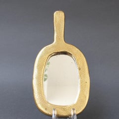 Miroir à main en céramique de forme ovale de François Lembo, "circa 1960".